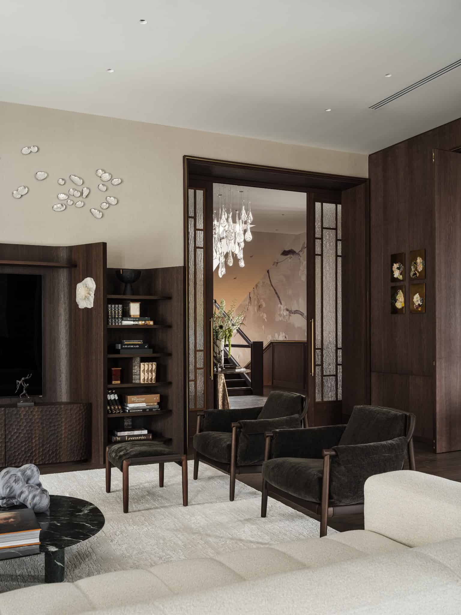 Modern Living Room with Open Doorway Contemporary living space viewed through open sliding doors from the hallway.