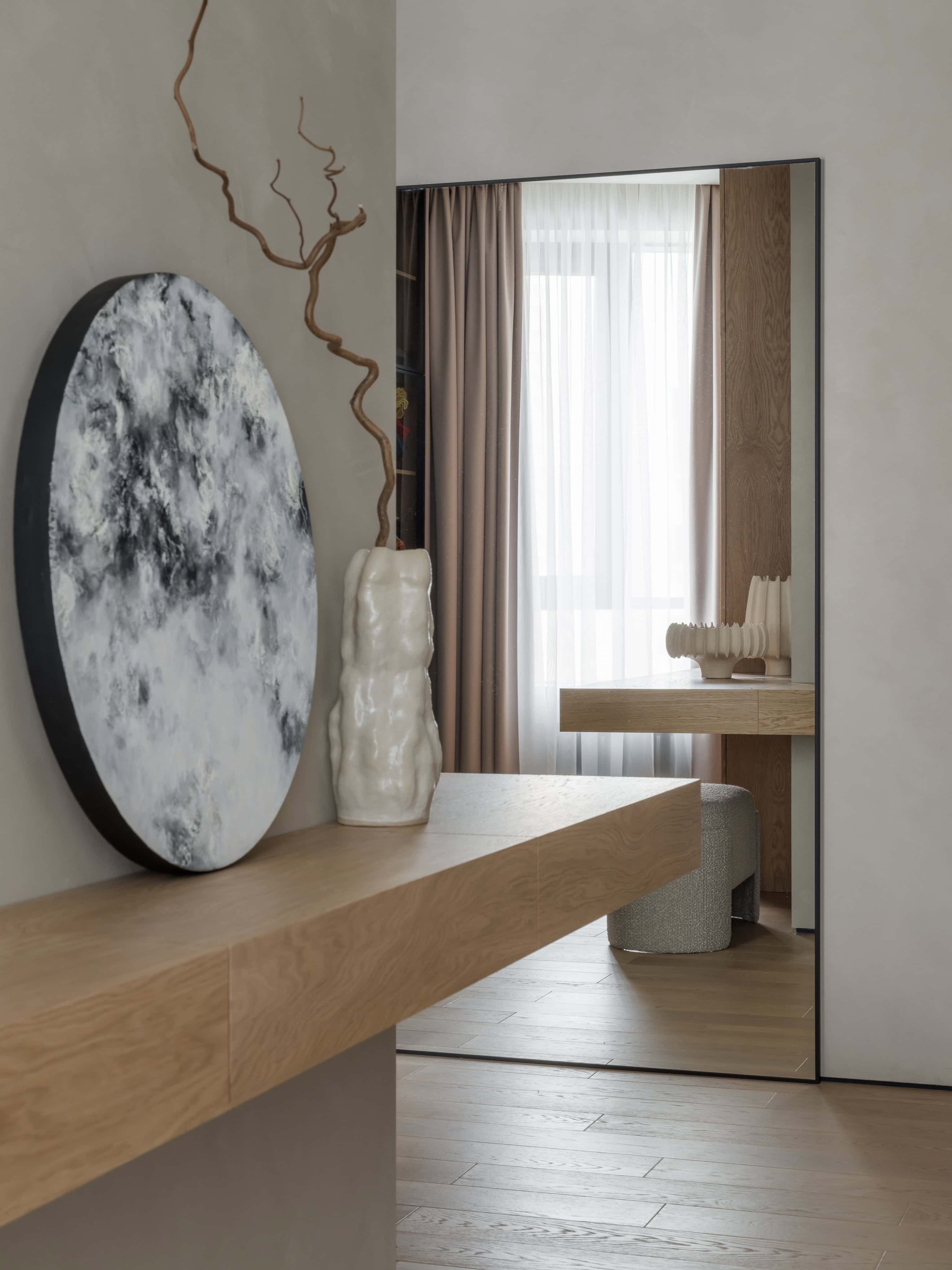 Neutral Bedroom Interior Design Warm neutral color scheme in a cozy and minimalist bedroom interior design.