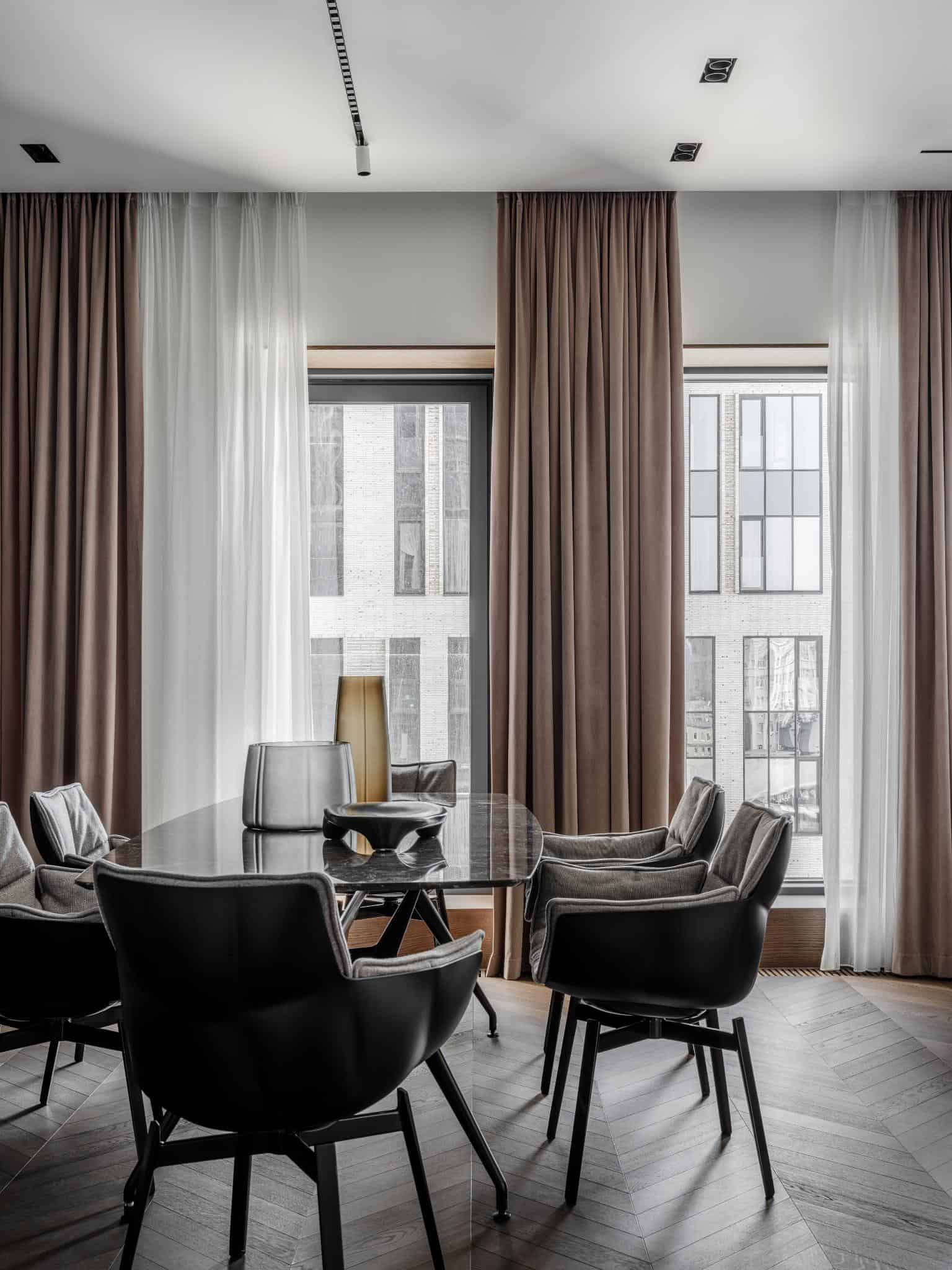 Open Living Dining Area With Large Windows Open living and dining area with large windows.