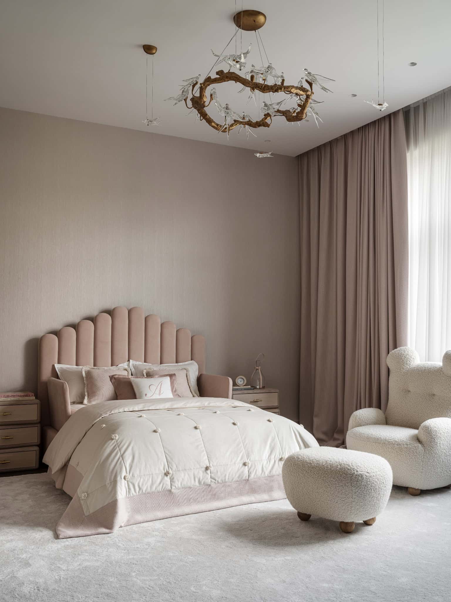 Pastel Kids Bedroom with Scalloped Headboard Soft pink kids' bedroom with scalloped upholstered headboard and unicorn decor.