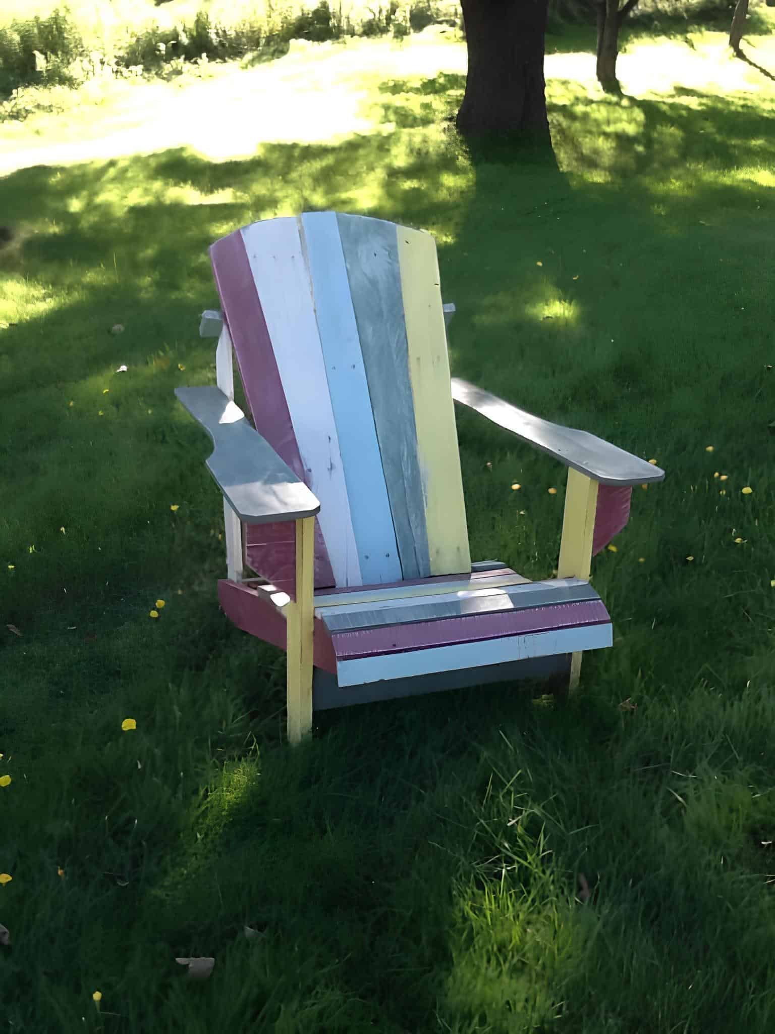 Colorful outdoor chair made from recycled pallet wood in pastel colors