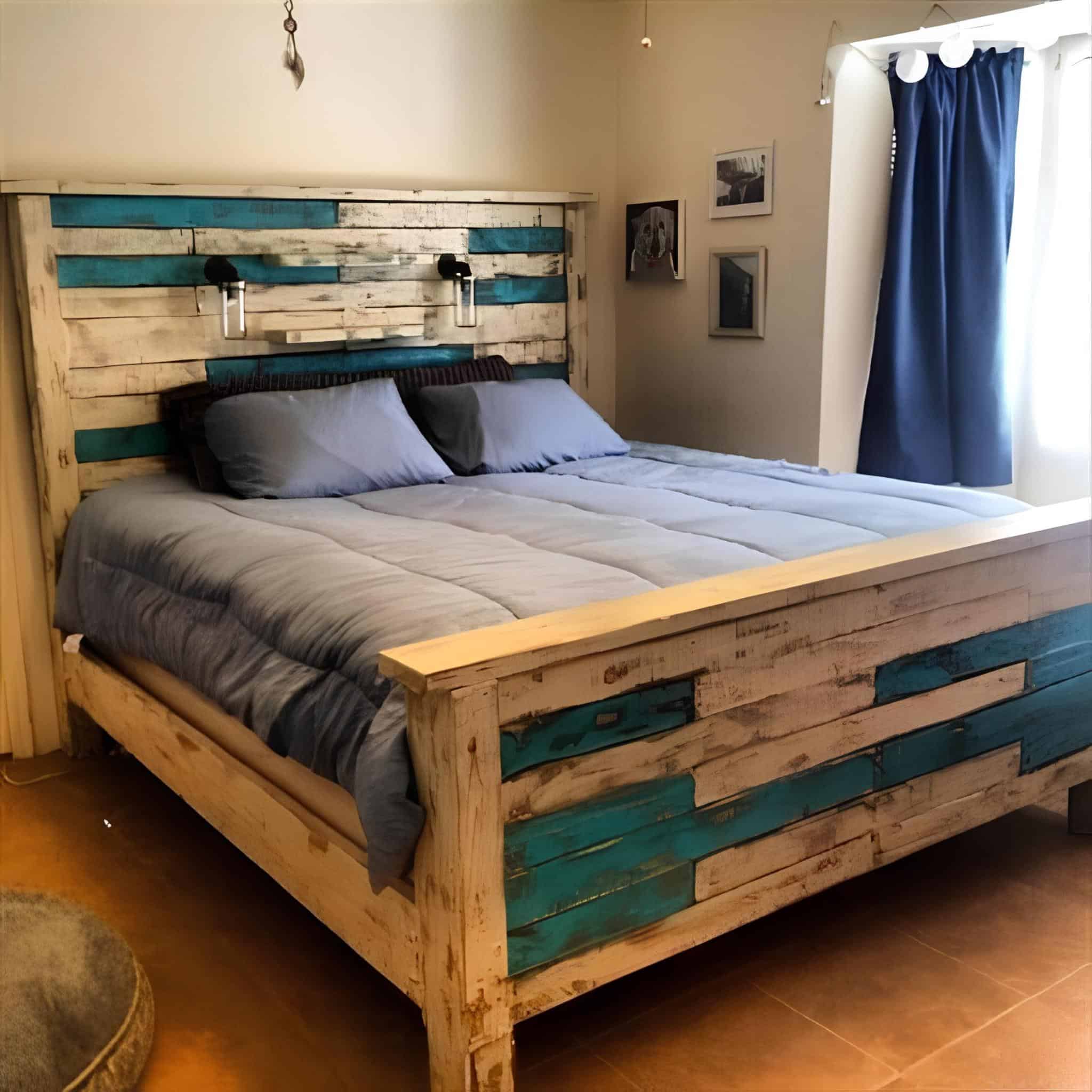 DIY rustic bed frame made from weathered and painted pallet slats