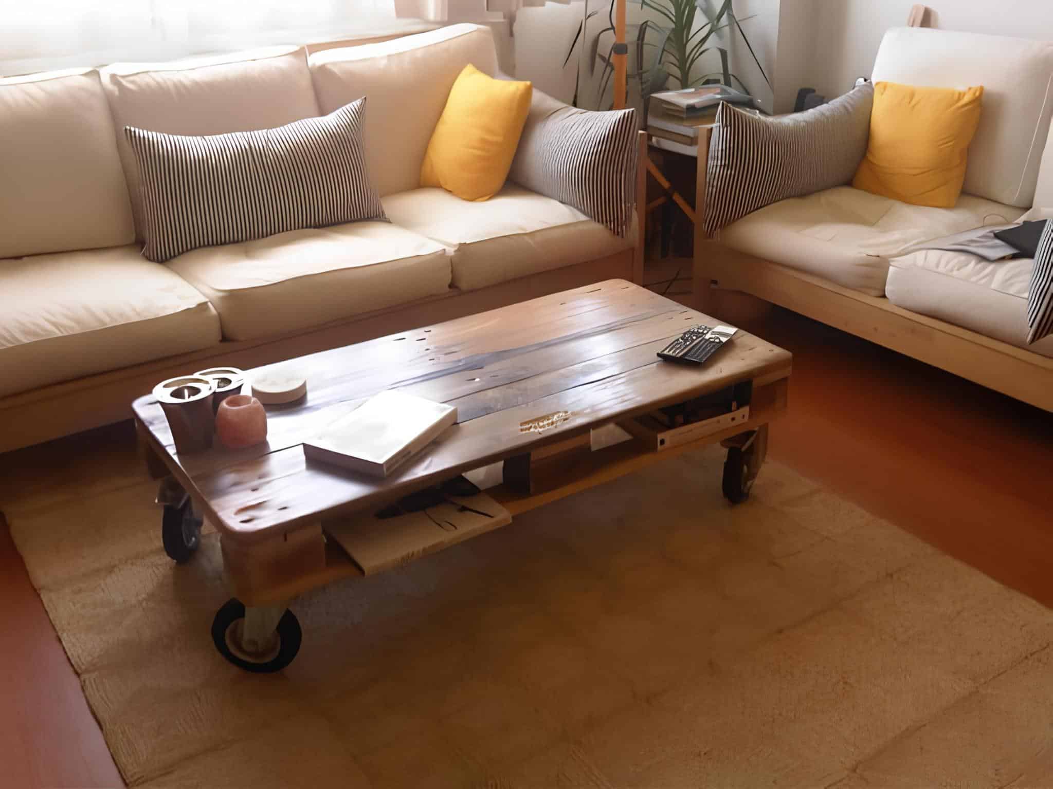Low coffee table made from reclaimed pallet with wheels