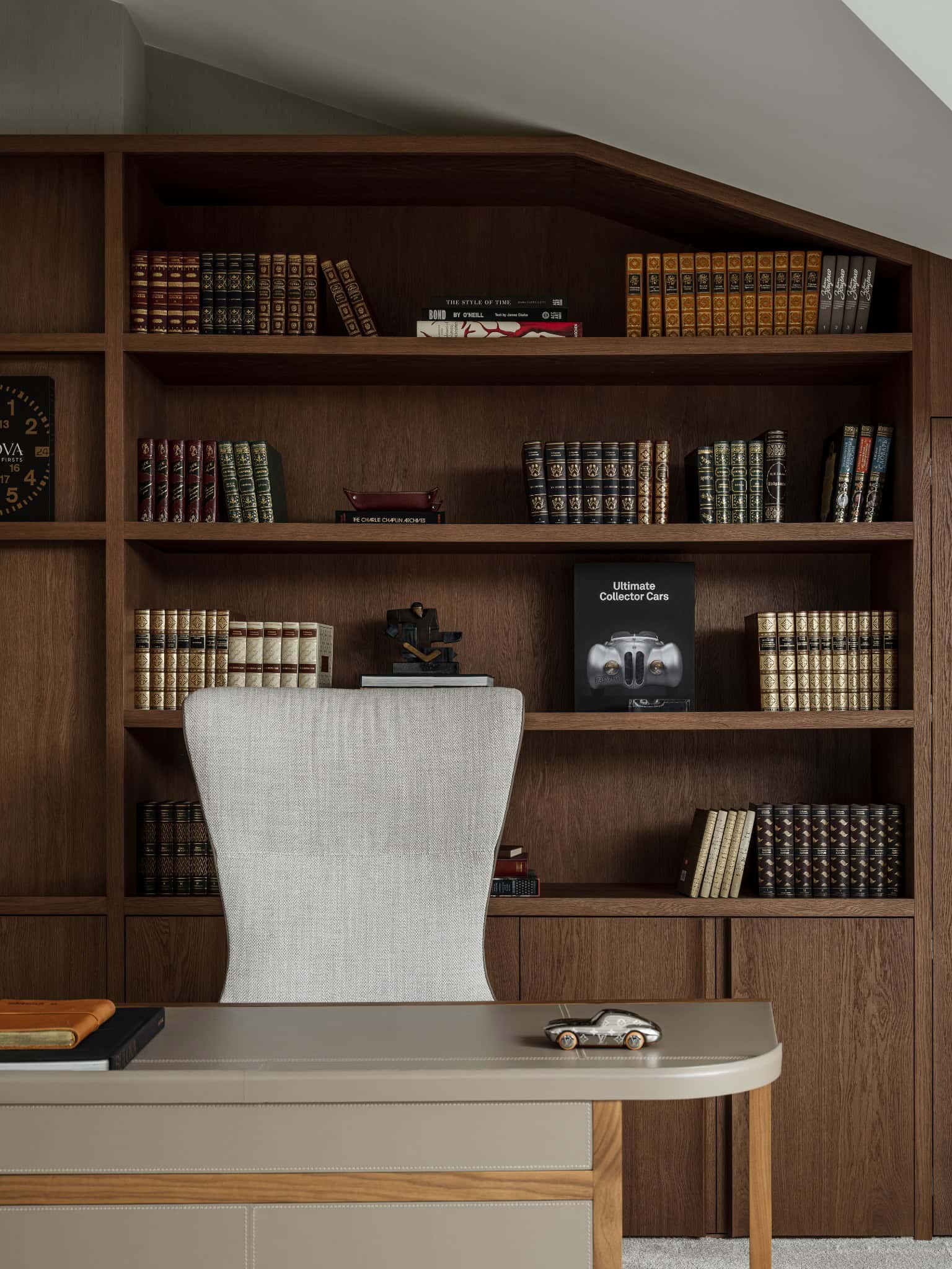 Round Bathroom Mirror Above Floating Sink Modern bathroom detail with large round mirror and wall-mounted sink.