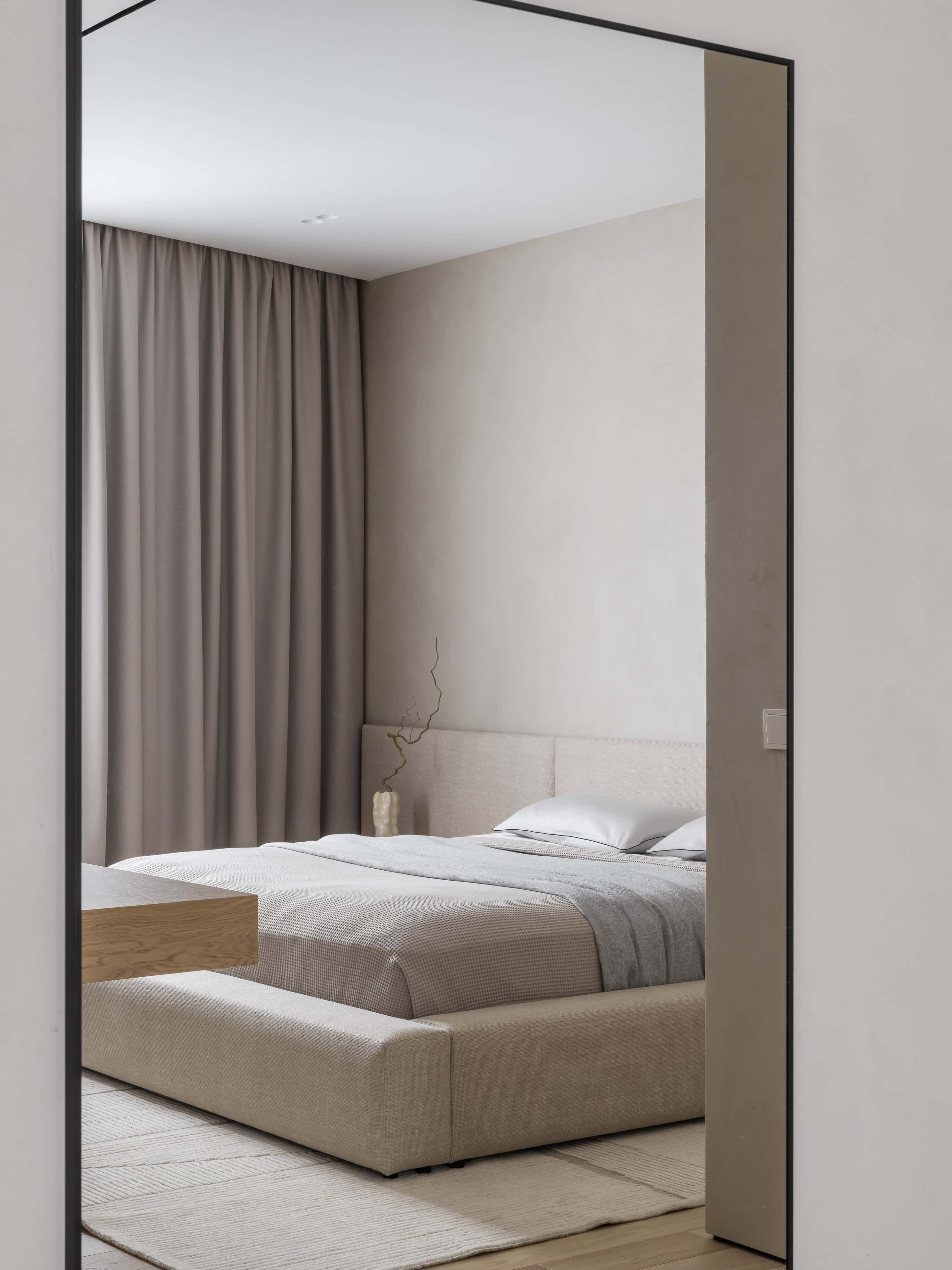 Soft Neutral Bedroom With Curtains Elegant modern bedroom with warm neutral palette, floor-length curtains, and minimal bedding.