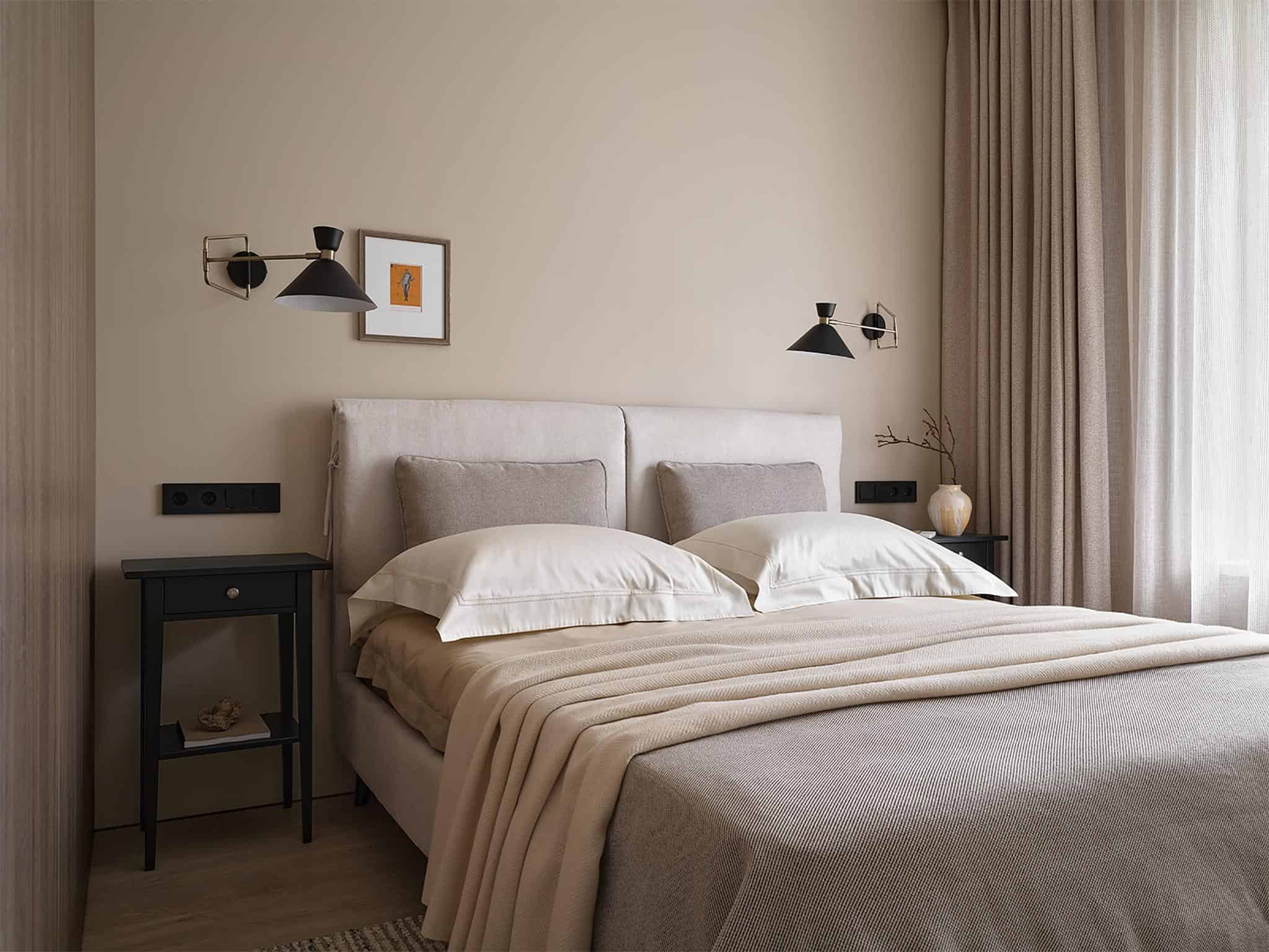 Soft-Toned Bedroom Design with Textured Curtains Soft-toned bedroom featuring textured beige curtains, upholstered bed, and accent lighting.
