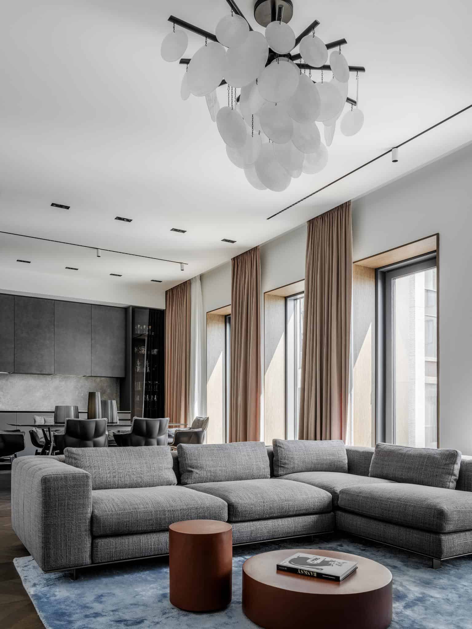 Spacious Living Room With Modern Chandelier Spacious living room with modern chandelier.