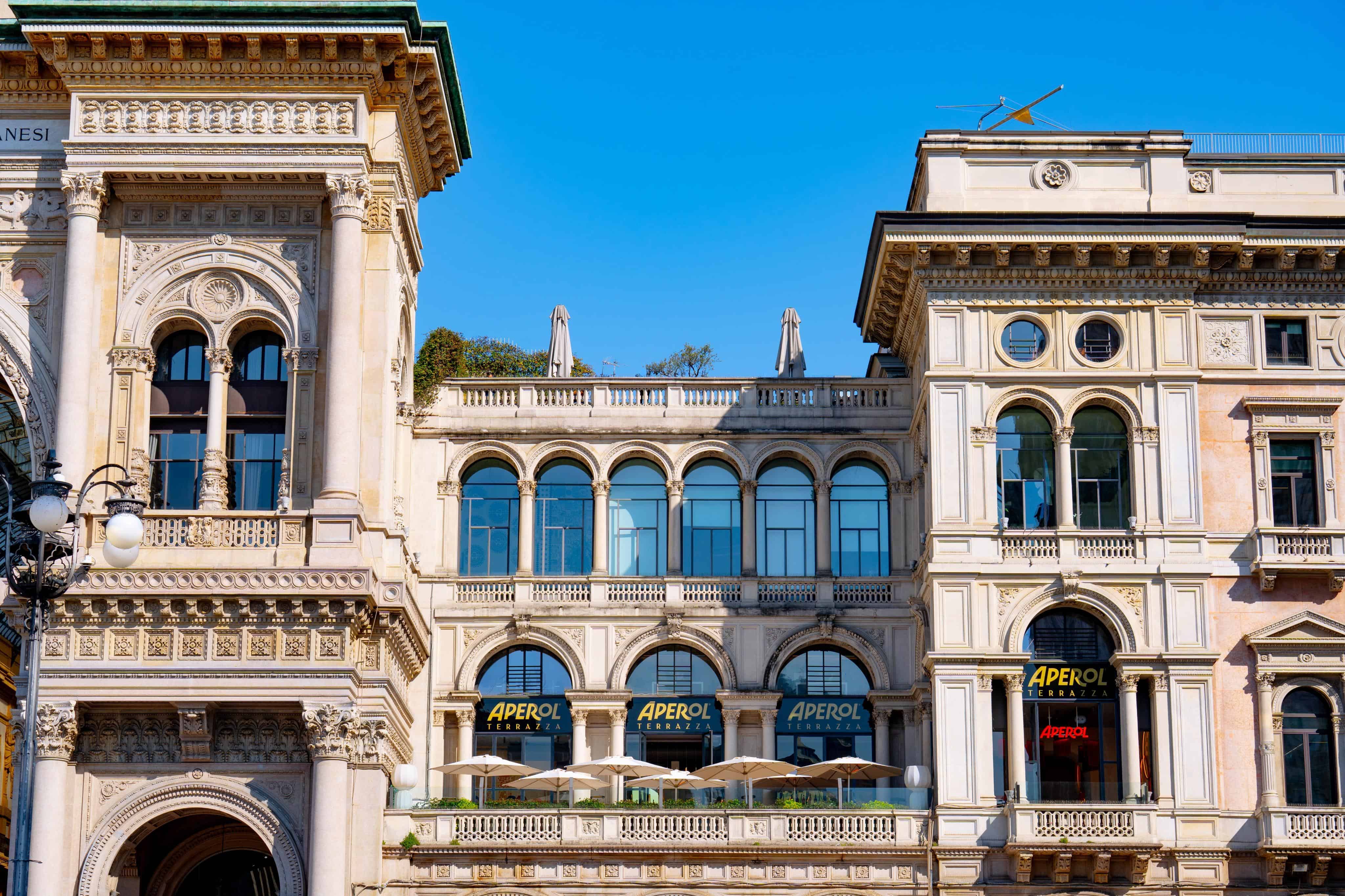 Terrazza Aperol Exterior Facade Piazza Duomo Milan Terrazza Aperol's elegant classical facade overlooking Piazza Duomo in Milan.