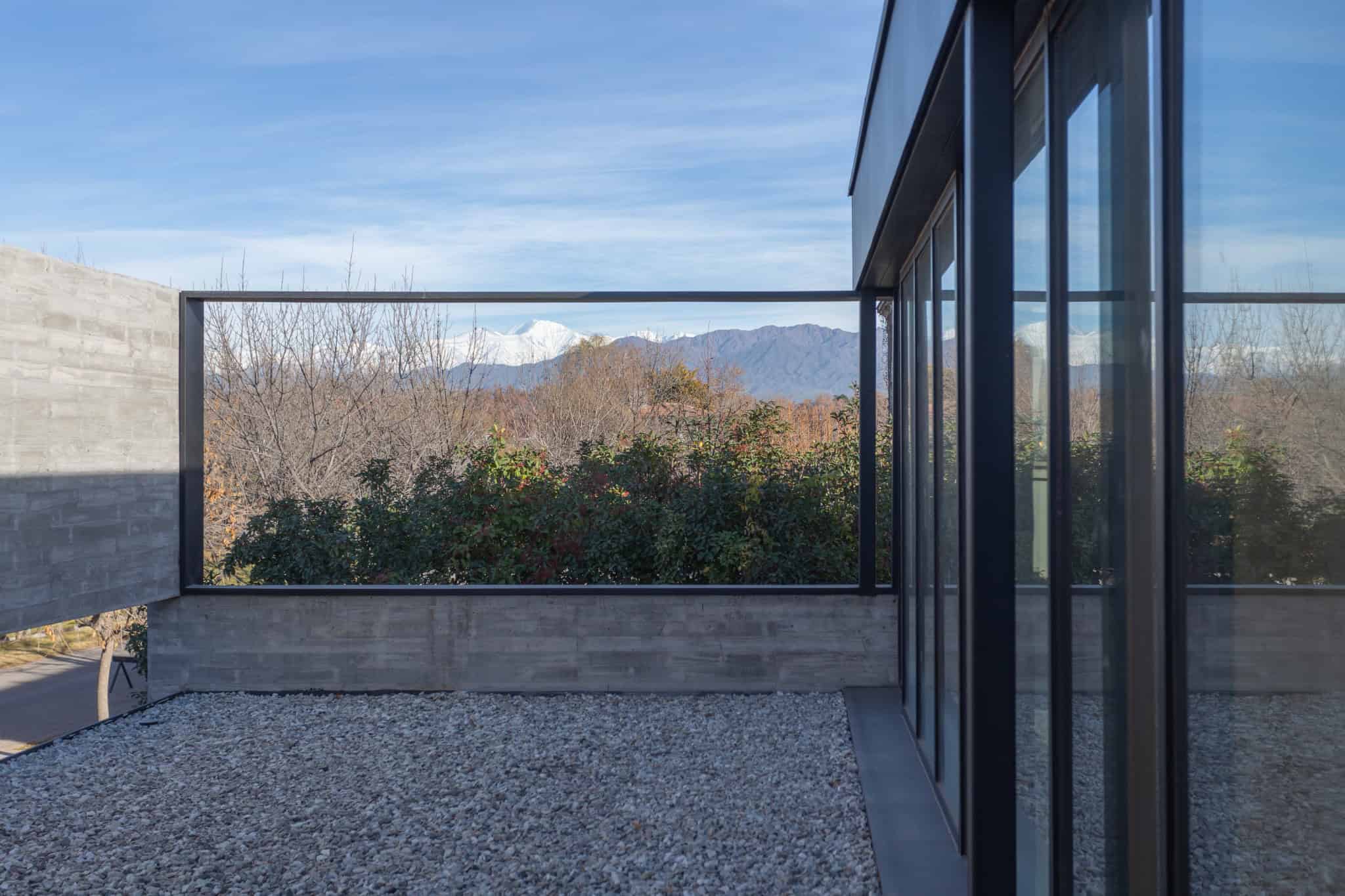 Andes Mountain View Framed Courtyard A4Estudio Casa EE by A4estudio - Andes mountain view framed courtyard a4estudio
