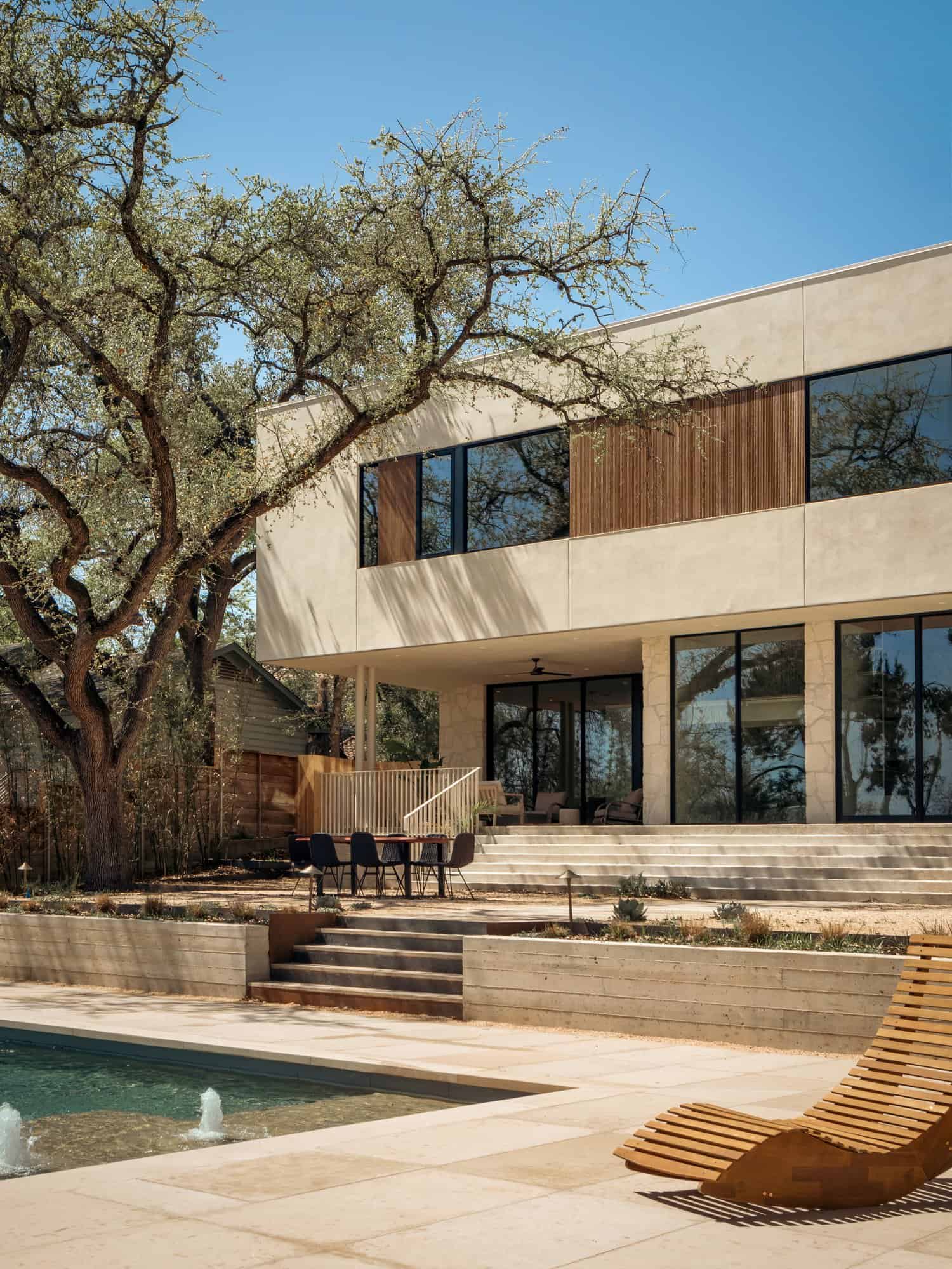 Casa Solis Covered Porch Wood Detail Wooden ceiling and stone wall creating shadows on the porch of Casa Solis.