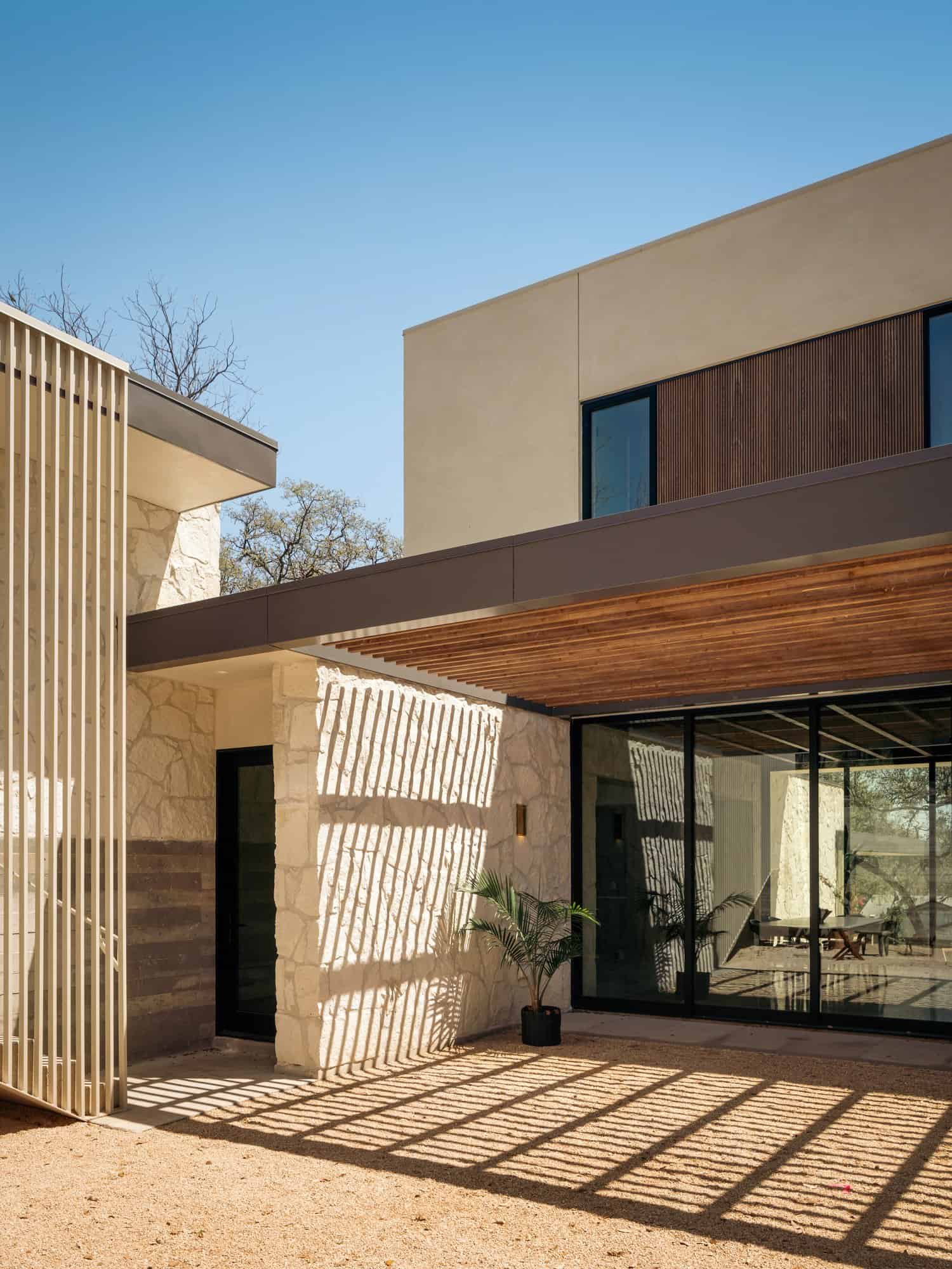 Casa Solis Evening View Modern Residence Modern evening view of Casa Solis with illuminated interiors and glass façade.