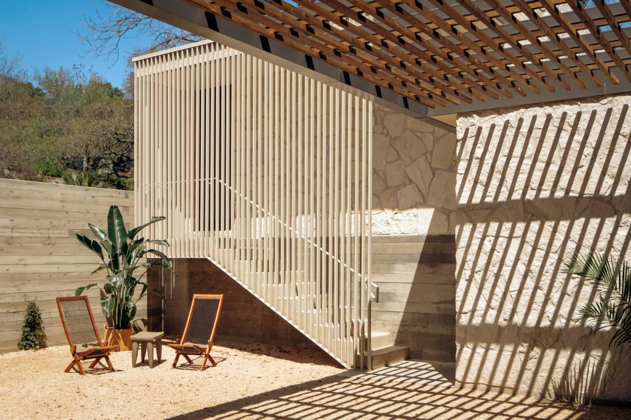 Casa Solis Full Living Room with Fireplace Complete view of Casa Solis living room with large fireplace and wood ceiling.