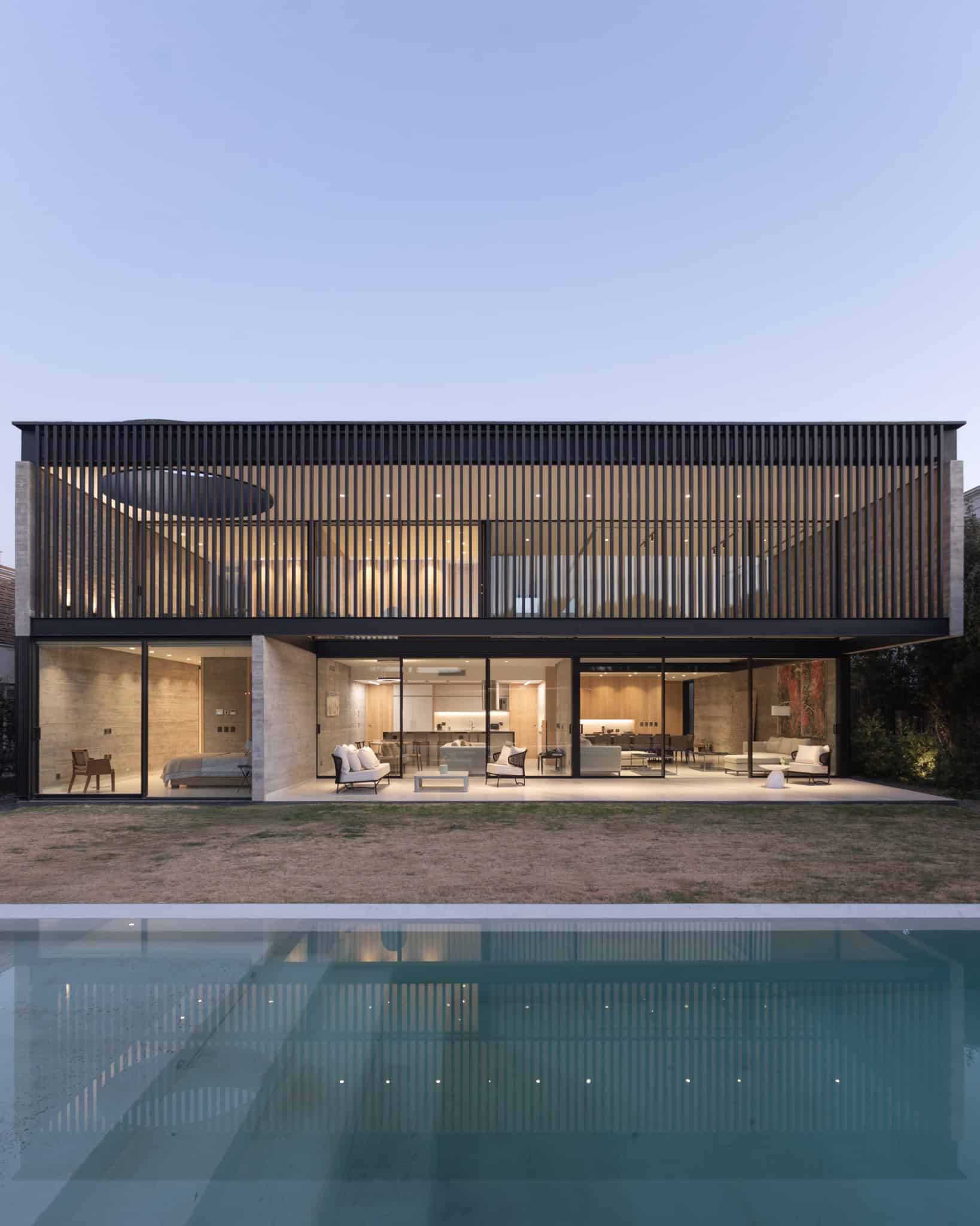Evening Pool View House Illuminated A4Estudio Casa EE by A4estudio - Evening pool view house illuminated a4estudio