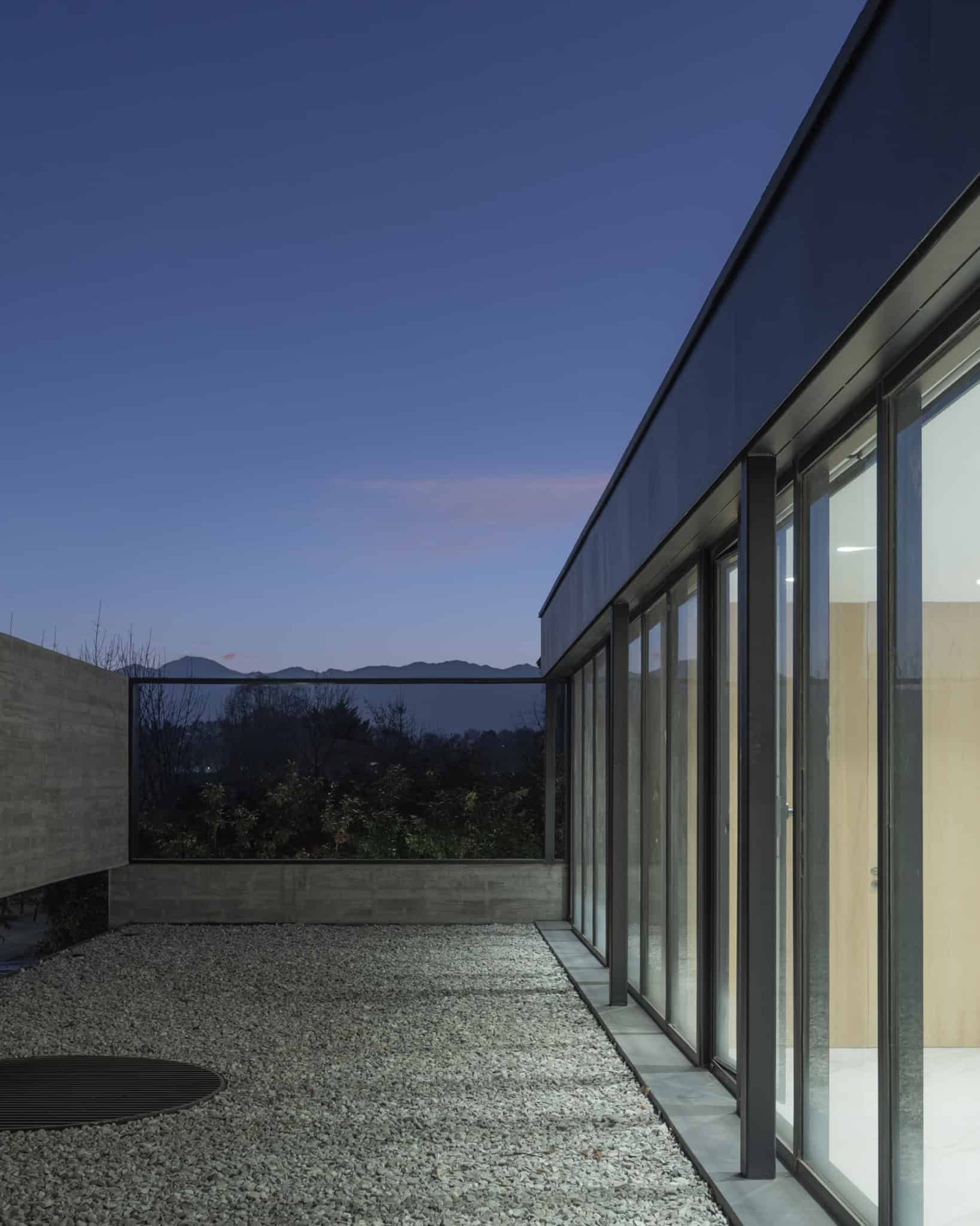 Mountain View From Courtyard Evening A4Estudio Casa EE by A4estudio - Mountain view from courtyard evening a4estudio