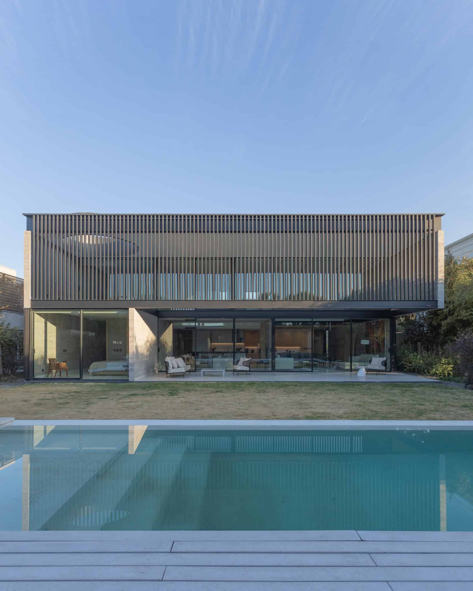 Sunlit Modern Poolside Facade A4Estudio Casa EE by A4estudio - Sunlit modern poolside facade a4estudio