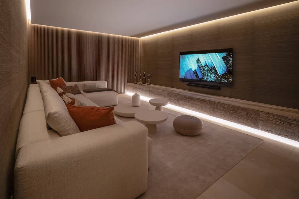 Villa Kaizen Cozy Home Cinema Home cinema room with warm lighting and modern furnishings in Villa Kaizen.