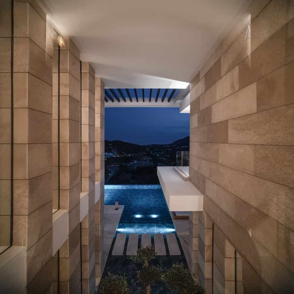 Villa Kaizen Framed Pool View at Night Framed night view of the infinity pool and ocean beyond from Villa Kaizen’s hallway.
