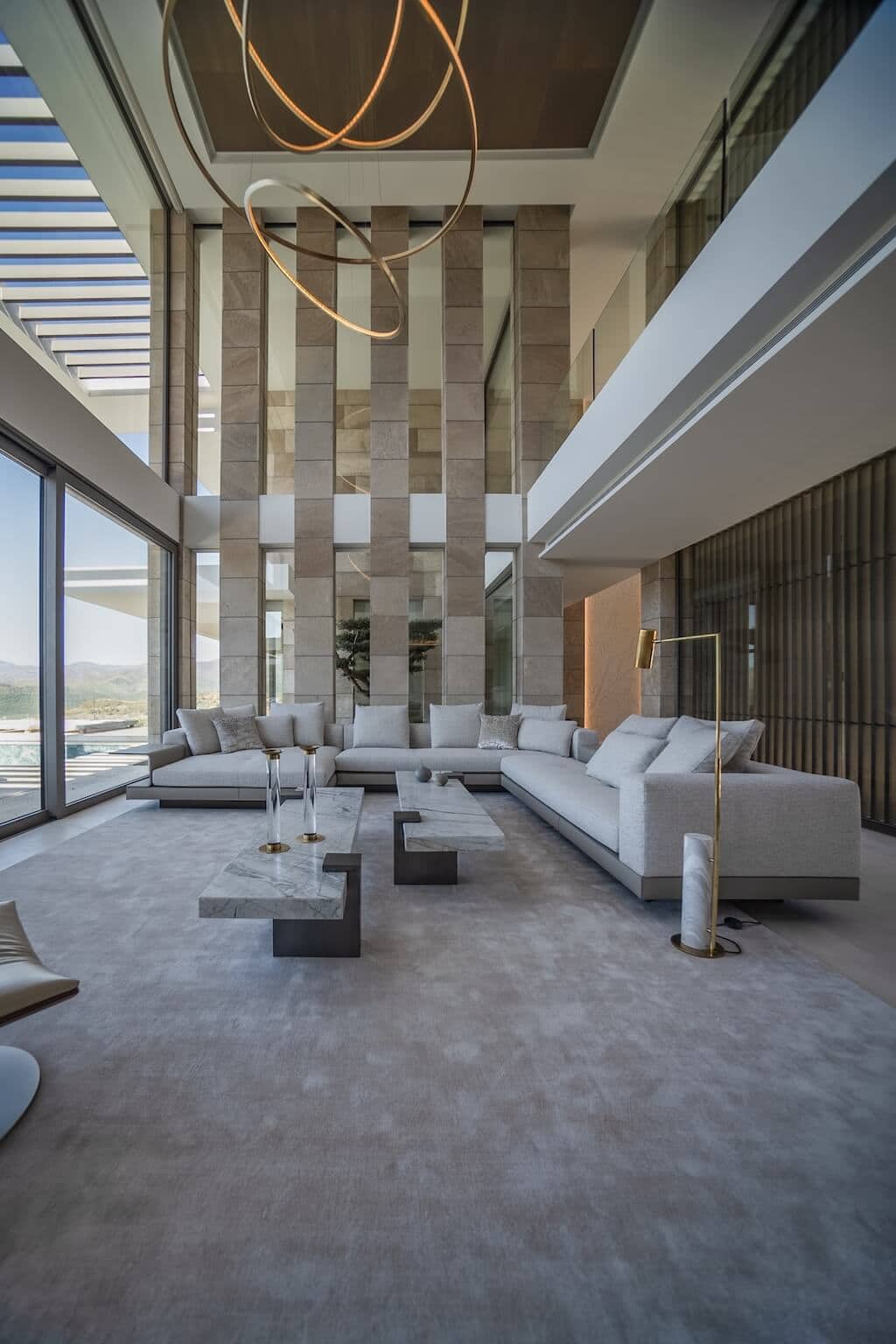 Villa Kaizen Living Room Interior Spacious and modern living room with high ceilings and mountain views at Villa Kaizen.