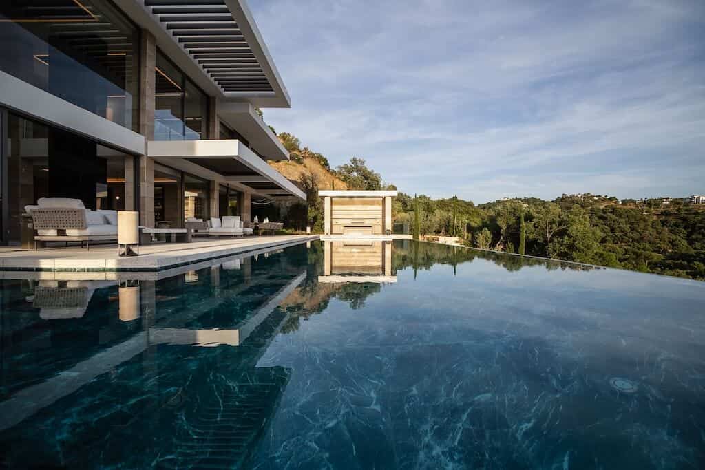 Villa Kaizen Reflective Infinity Edge Infinity pool at Villa Kaizen reflecting the architecture and natural surroundings.