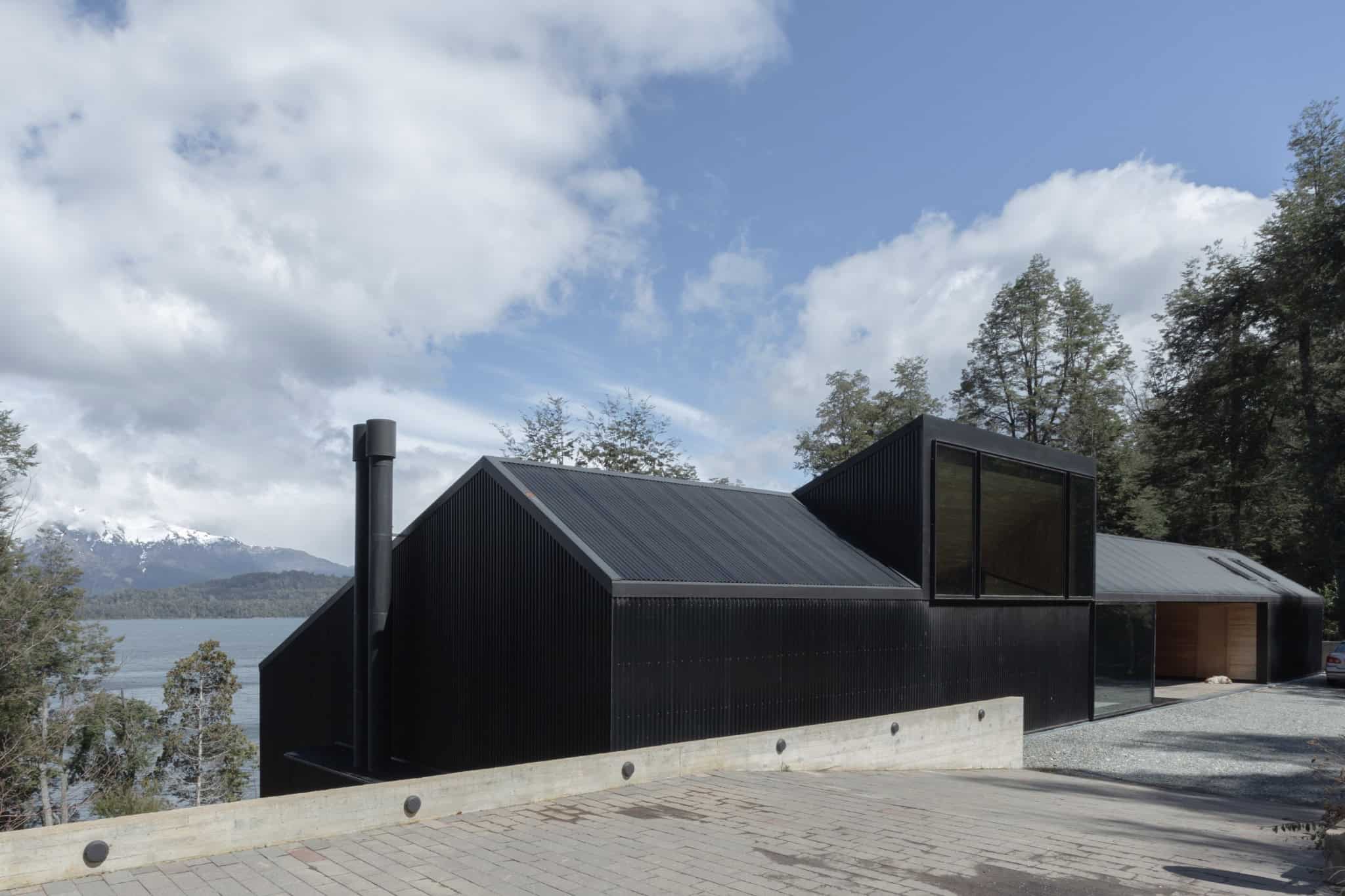 Scenic forest and Andes backdrop of VLA House designed by A4estudio.