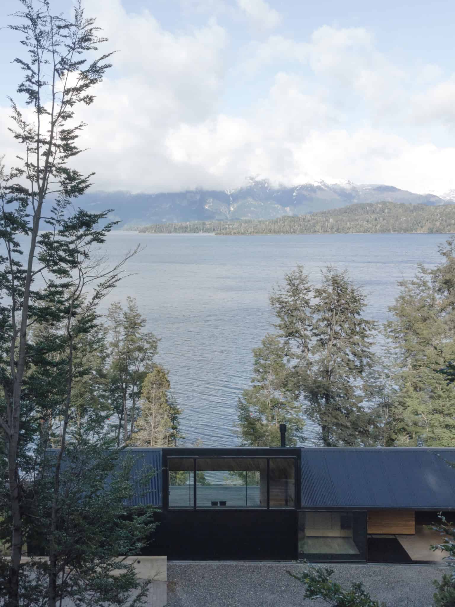 VLA House by A4estudio with stunning lake and Andes mountain view.