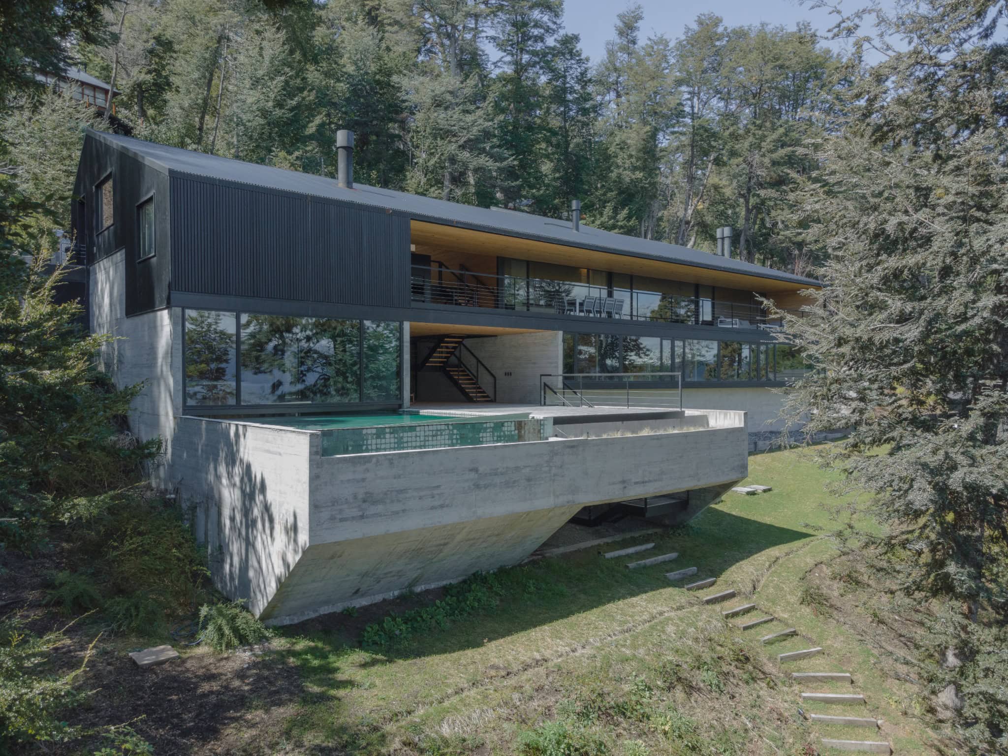 Minimalist pool terrace design of VLA House by A4estudio.