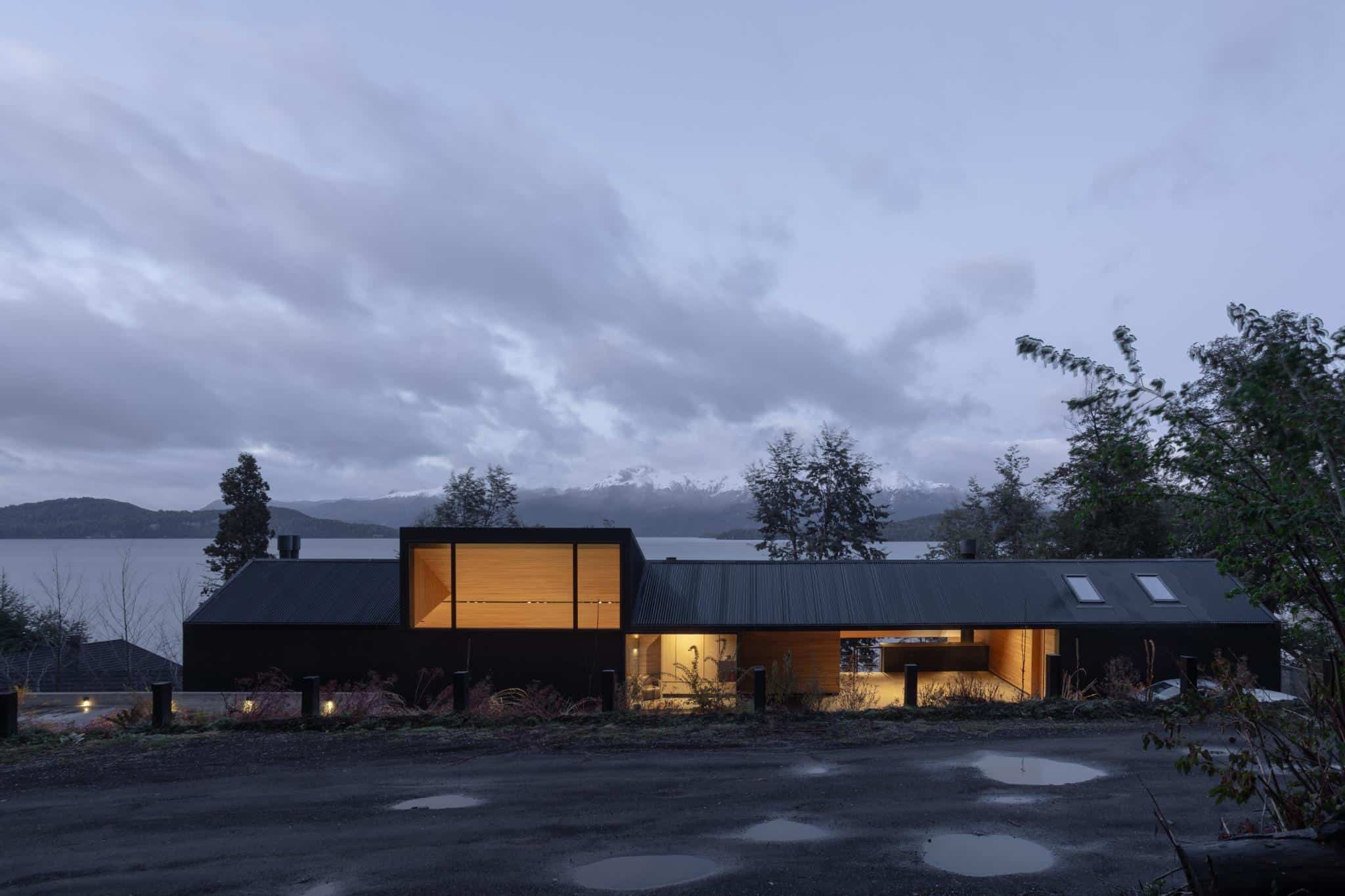 Architectural detail of timber framing and glass at VLA House by A4estudio.