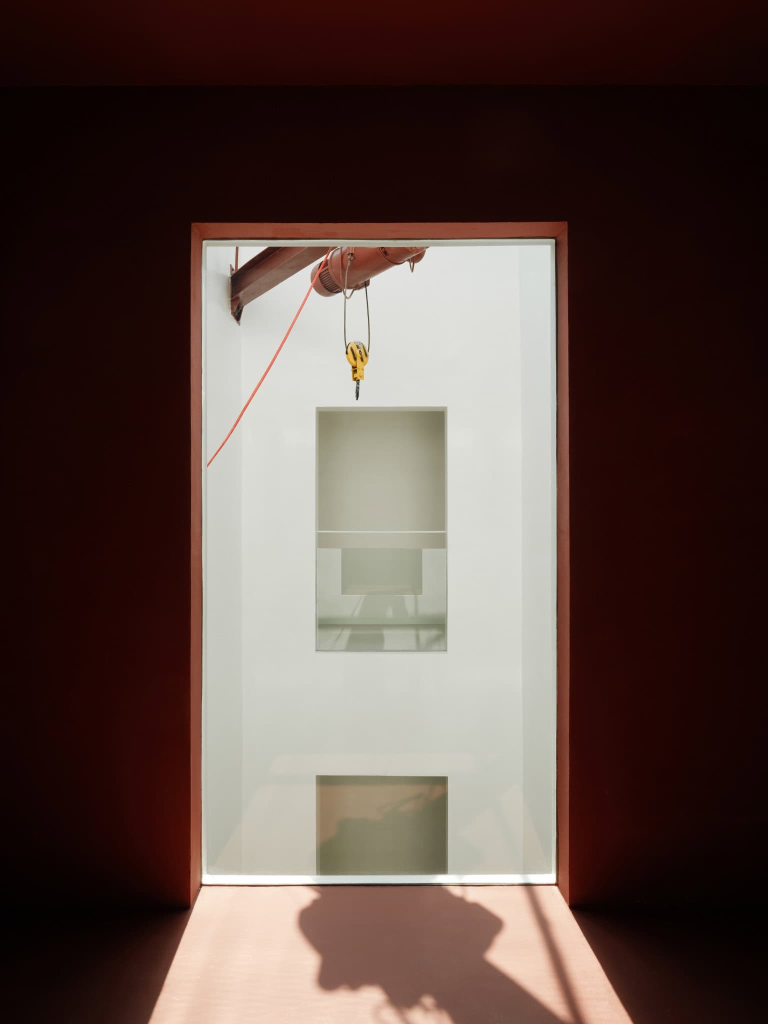 Atrium Hosting Suspended Art Installations Central atrium space designed for suspended art exhibitions