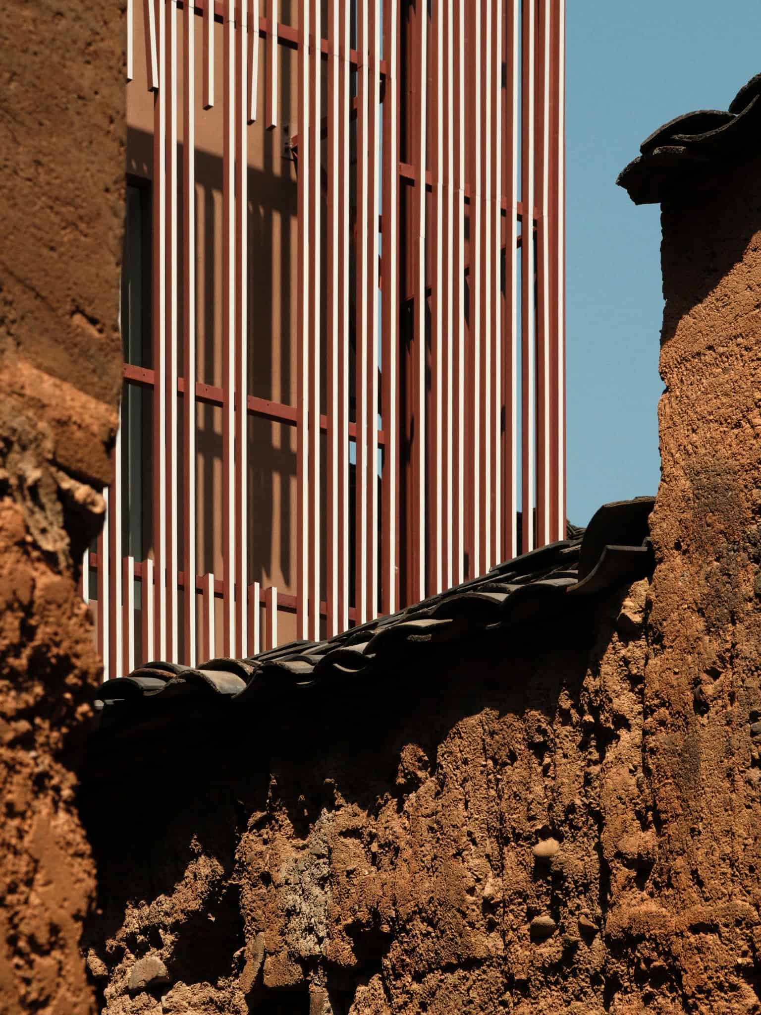 Z Museum New vs Old Architecture Juxtaposition of modern Z Museum against traditional earthen buildings