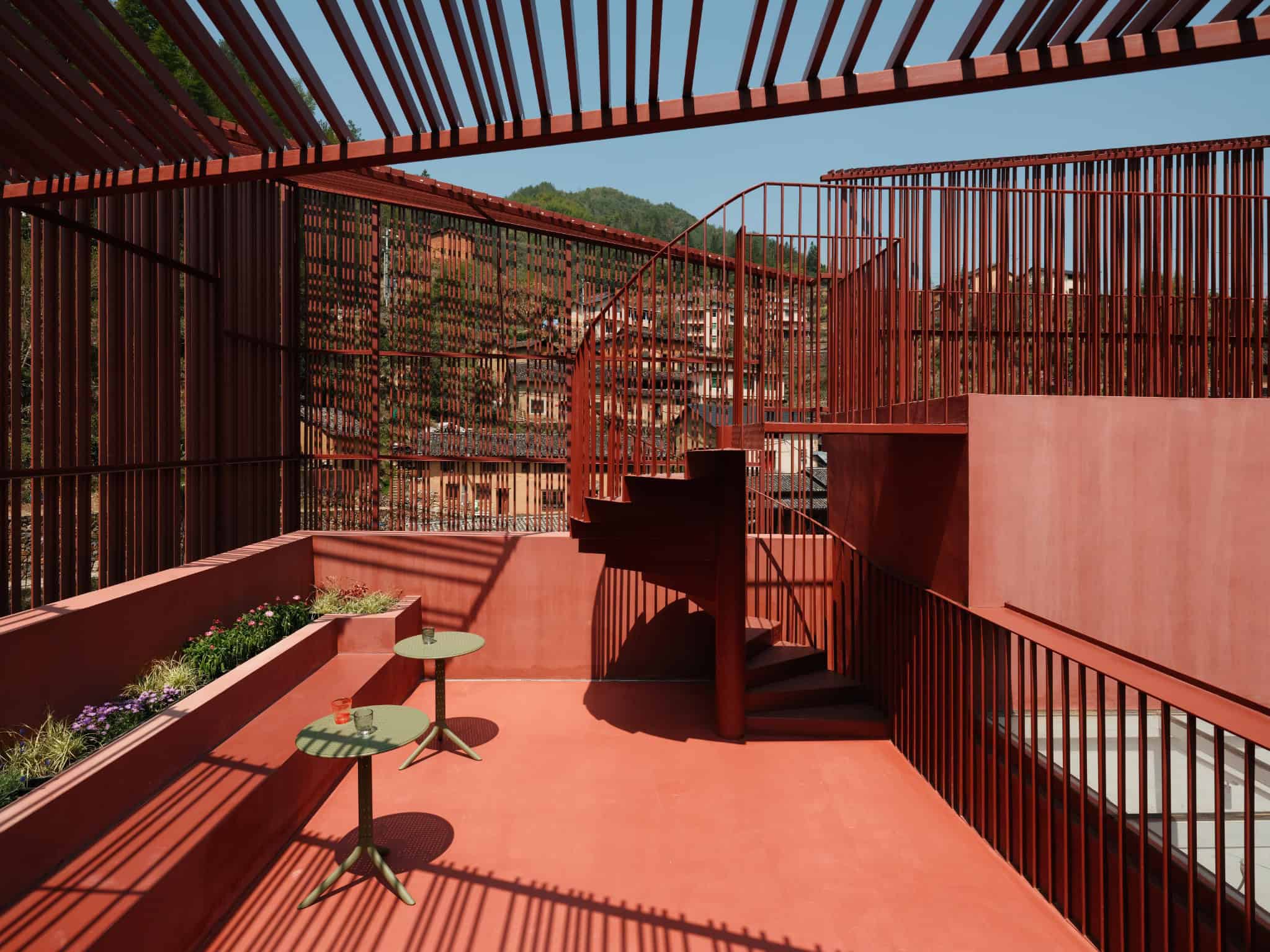 Outdoor Spiral Staircase to Viewing Platform Red spiral staircase at Z Museum terrace leading visitors to upper viewpoint