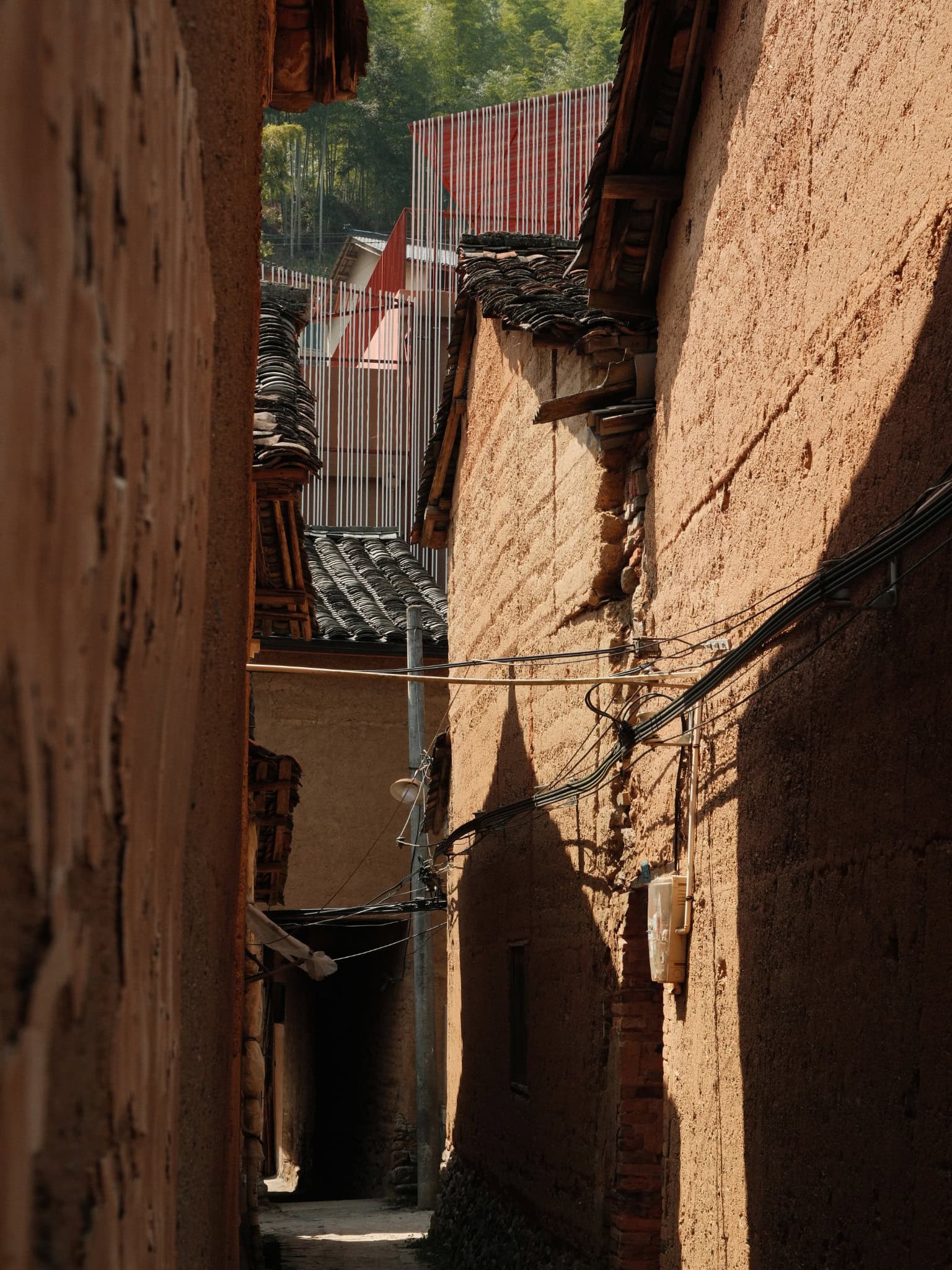 Z Museum Seen from Ancient Alley Modern Z Museum viewed through the narrow alleys of the old village