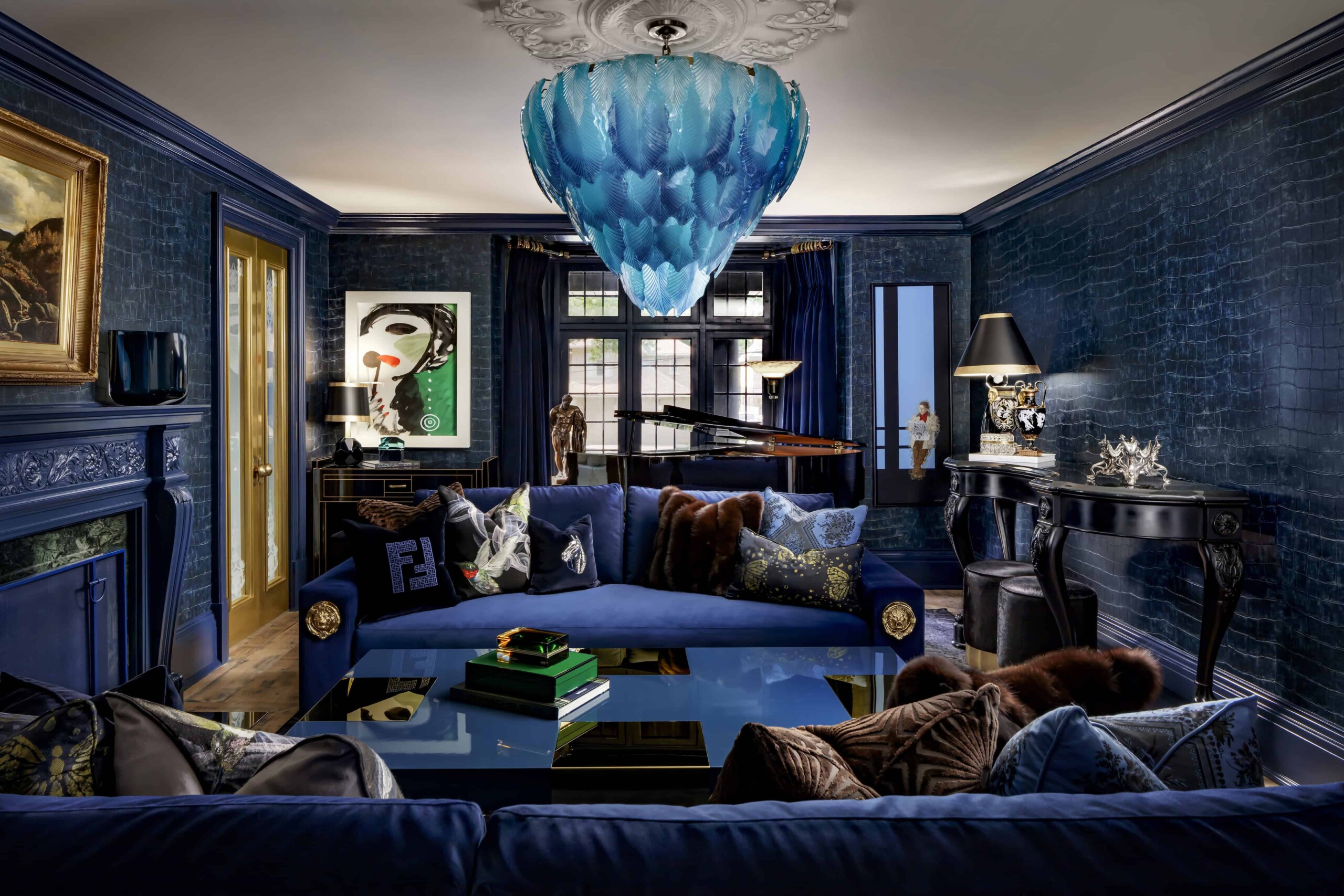 Luxurious interior living room with bold dark blue walls, elegant furniture, eclectic art, and a stunning blue chandeliers, exemplifying high-end architecture art design.