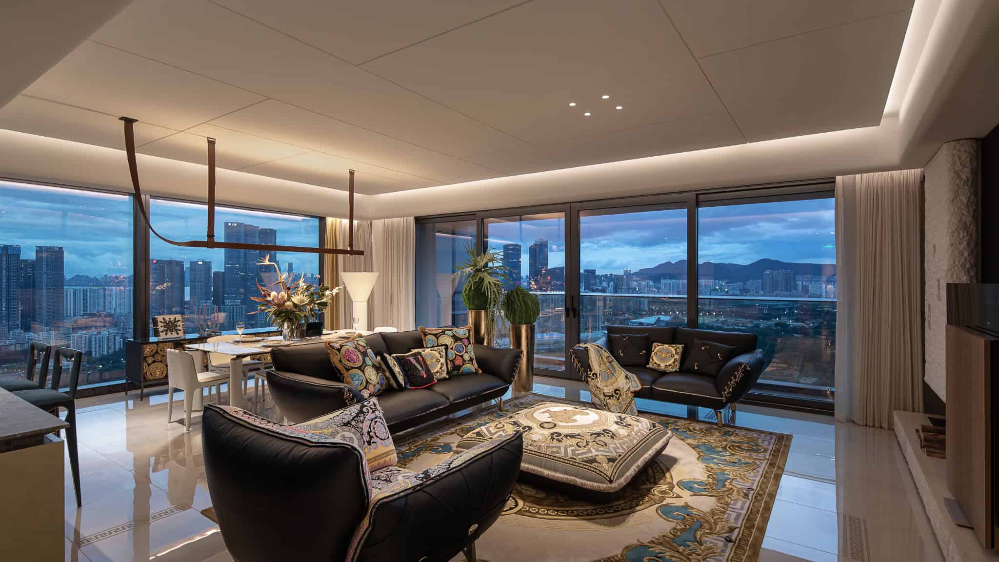 Azure Heights open plan living dining night by BDSD Boundless Design, Shenzhen, China