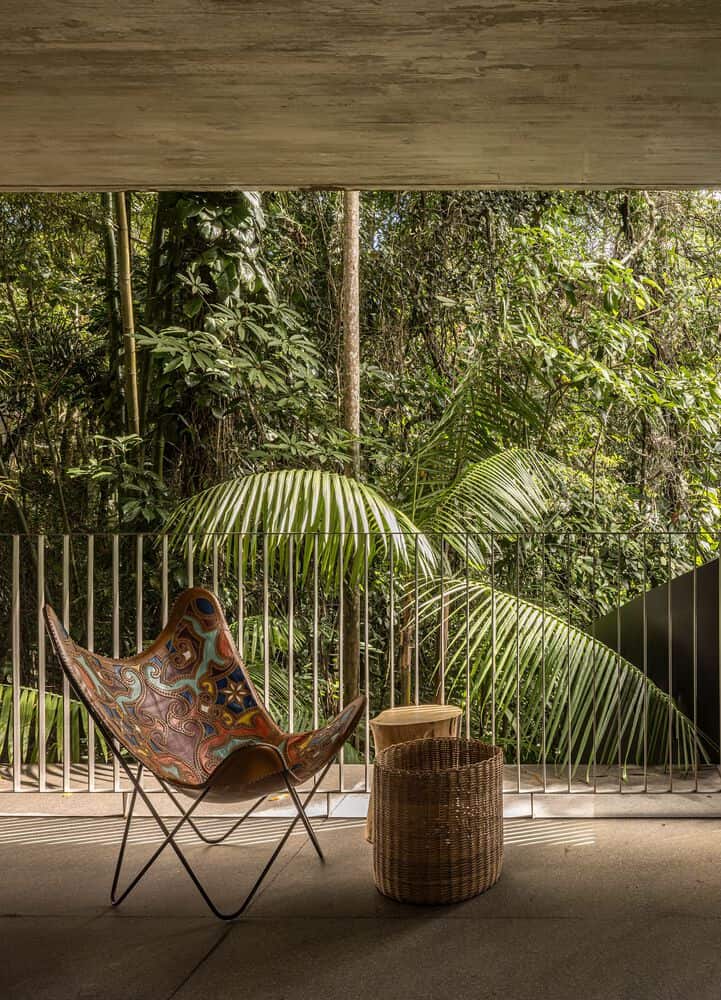 Canopy House Colorful Chair Balcony by Studio MK27 Canopy House by Studio MK27 – balcony with colorful chair and tropical view, Guarujá, Brazil