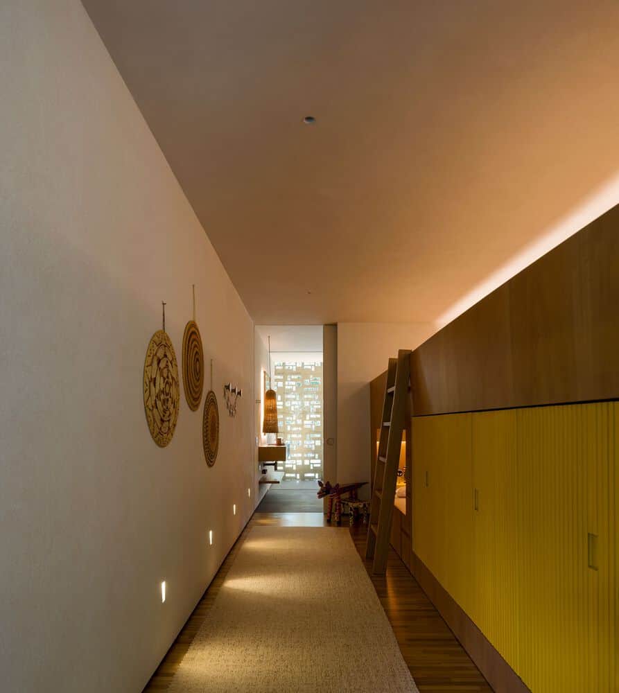 Canopy House Corridor Yellow Cabinets by Studio MK27 Canopy House by Studio MK27 – corridor with yellow cabinets, Guarujá, Brazil