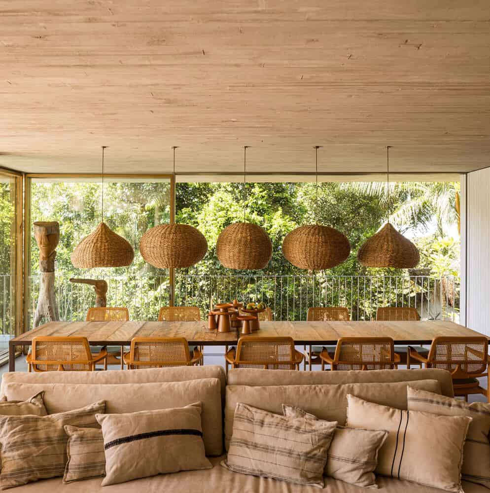 Canopy House Dining Area Rattan Lamps by Studio MK27 Canopy House by Studio MK27 – dining area with rattan pendant lamps, Guarujá, Brazil