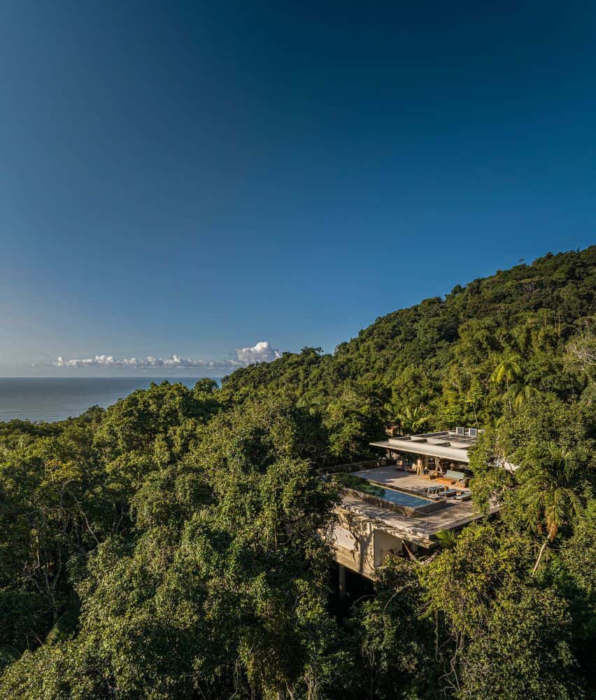 Canopy House Forest Overhead View by Studio MK27 Aerial view of Canopy House by Studio MK27, surrounded by dense forest in Guarujá, Brazil