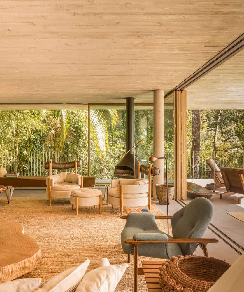 Canopy House Living Room Fireplace by Studio MK27 Canopy House by Studio MK27 – living room with fireplace and seating, Guarujá, Brazil