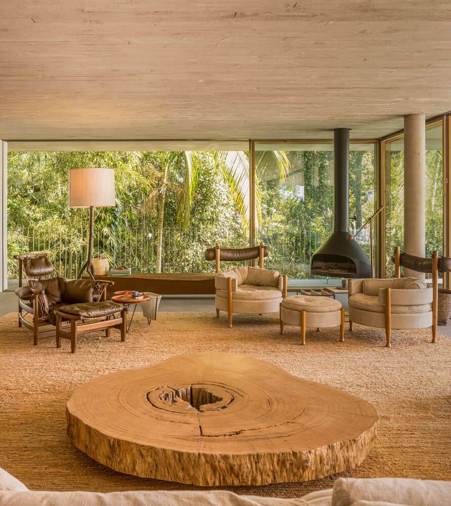 Canopy House Living Room Tree Table by Studio MK27 Canopy House by Studio MK27 – living room with large tree-slice table, Guarujá, Brazil