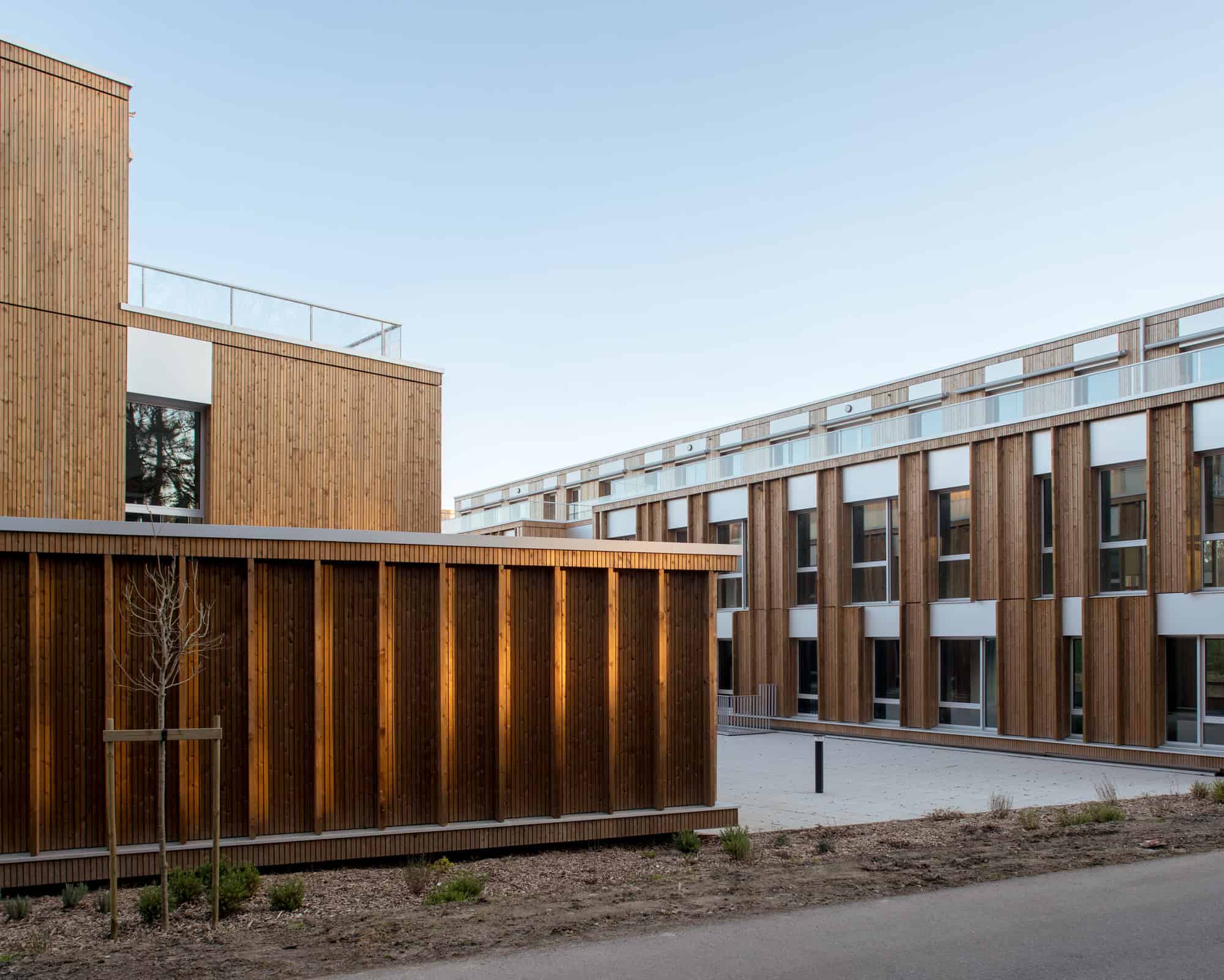 Le Chemin du Bois Harel Courtyard Corner View by ALTA Architectes Le Chemin du Bois Harel by ALTA Architectes — Courtyard Corner View, Rennes / Saint-Jacques-de-la-Lande, France