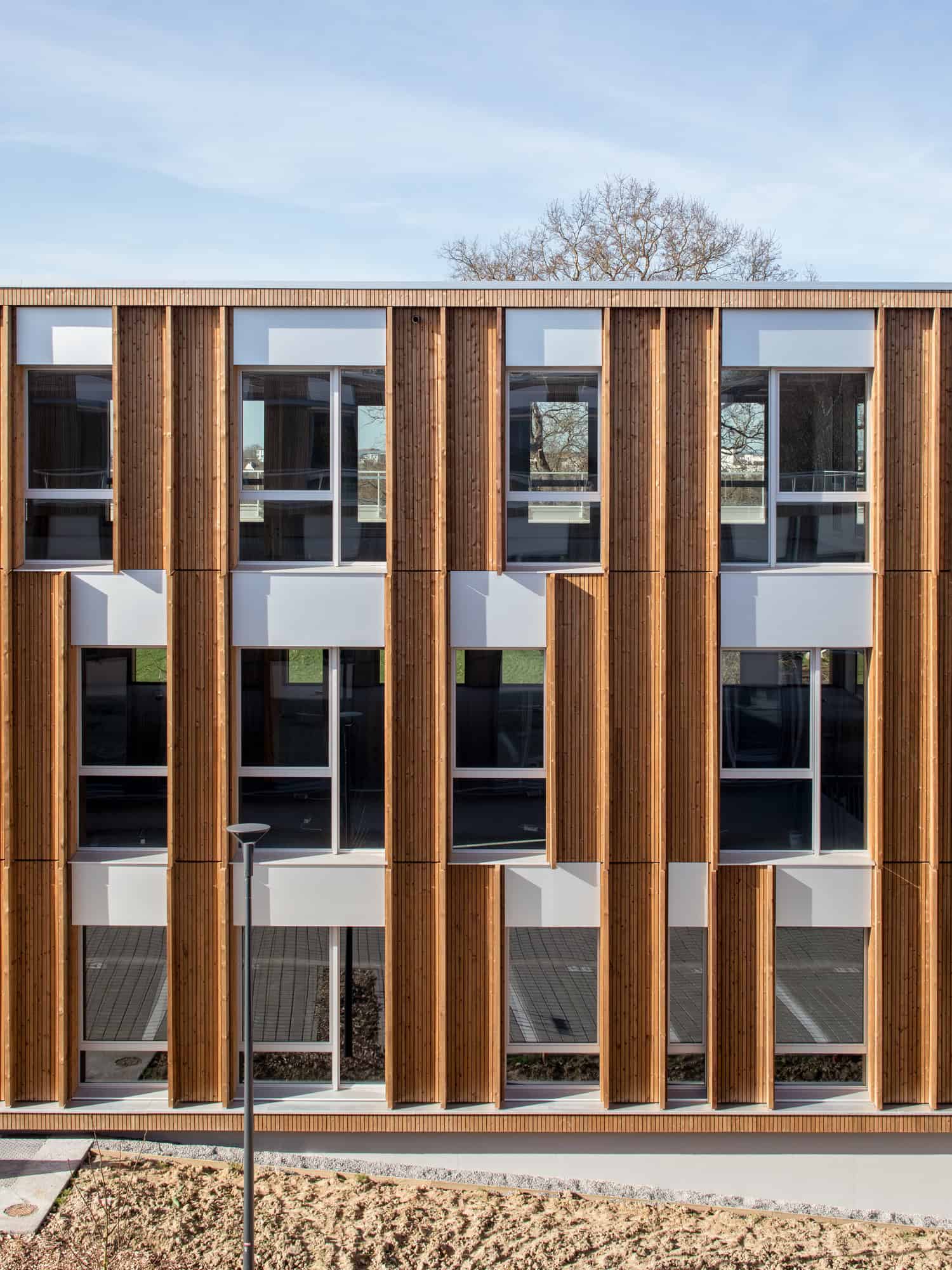 Le Chemin du Bois Harel Facade Elevation Portrait by ALTA Architectes Le Chemin du Bois Harel by ALTA Architectes — Facade Elevation Portrait, Rennes / Saint-Jacques-de-la-Lande, France