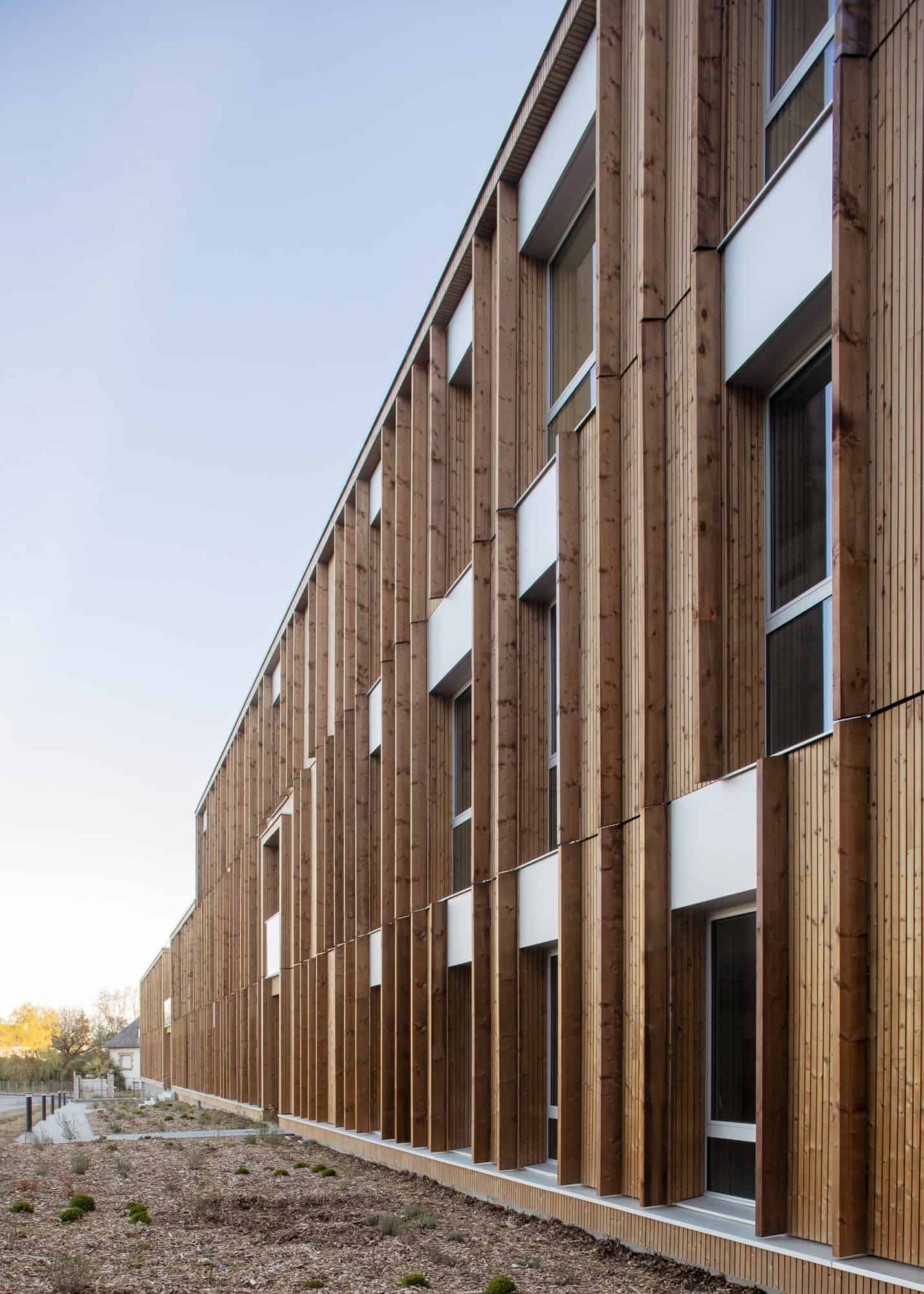 Le Chemin du Bois Harel Long Elevation View by ALTA Architectes Le Chemin du Bois Harel by ALTA Architectes — Long Elevation View, Rennes / Saint-Jacques-de-la-Lande, France