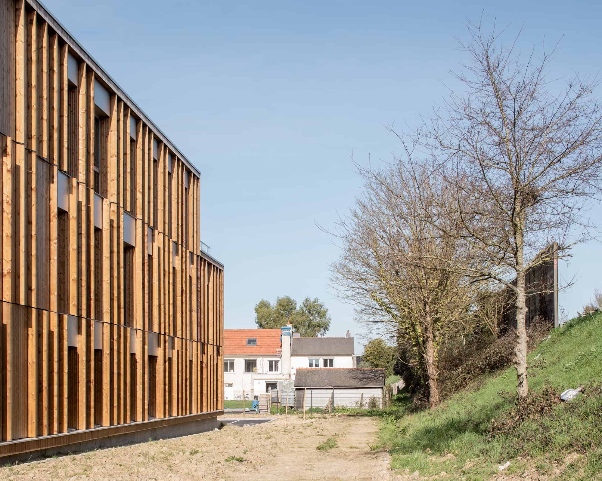 Le Chemin du Bois Harel Side Elevation Path by ALTA Architectes Le Chemin du Bois Harel by ALTA Architectes — Side Elevation Path, Rennes / Saint-Jacques-de-la-Lande, France