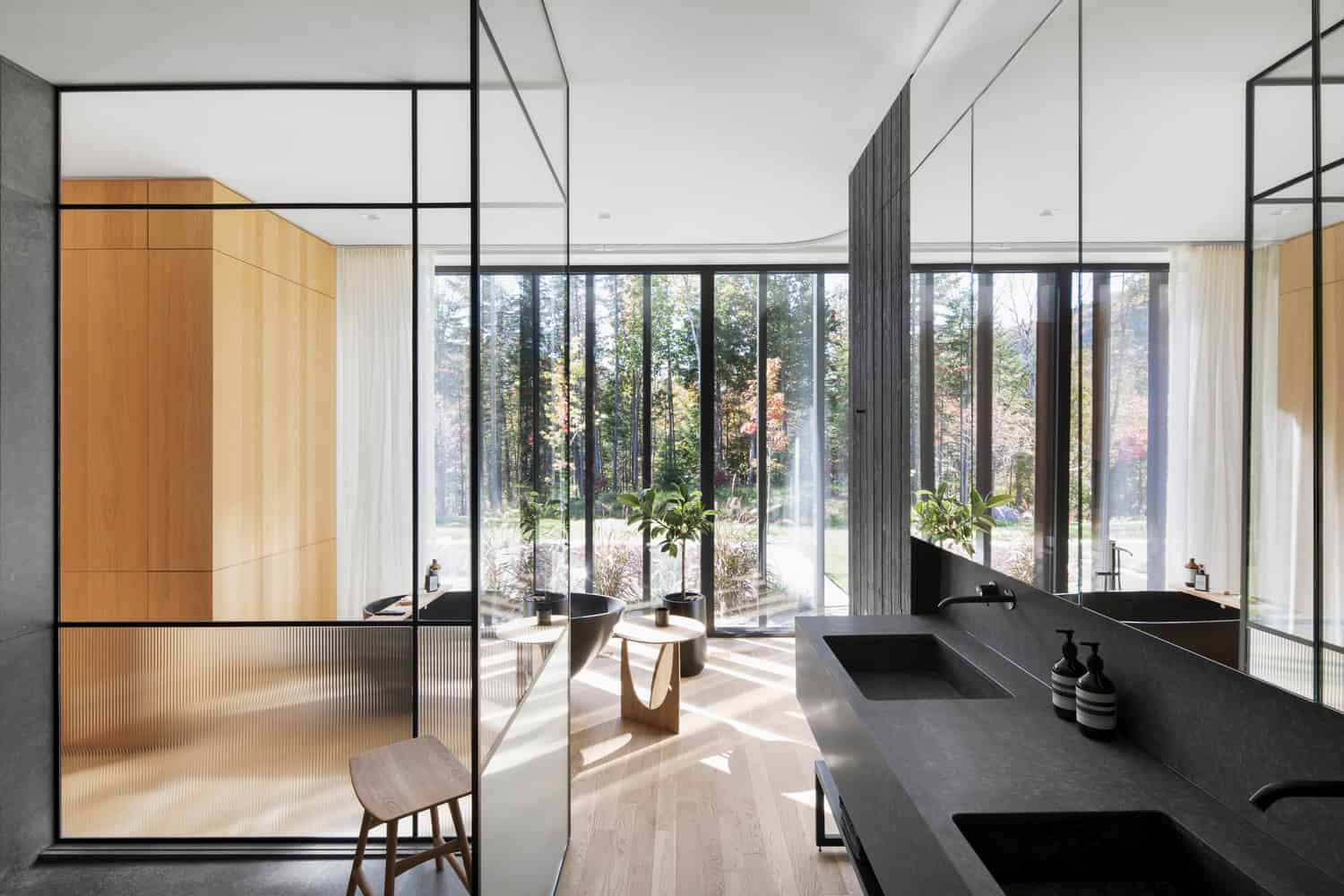 The House of la Baie de l’Ours by ACDF Architecture: A Lakeside Timber Retreat in Québec Spacious dining area of La Maison de la Baie de l’Ours