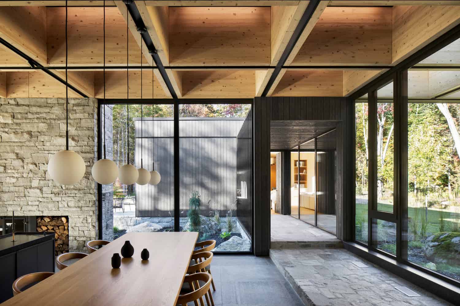 The House of la Baie de l’Ours by ACDF Architecture: A Lakeside Timber Retreat in Québec Exterior entrance of La Maison de la Baie de l’Ours