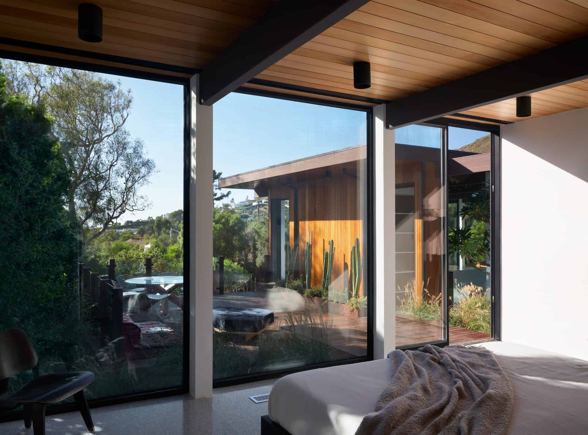Malibu Glass Box House by Klopf Architecture – bedroom with courtyard view, Malibu, California