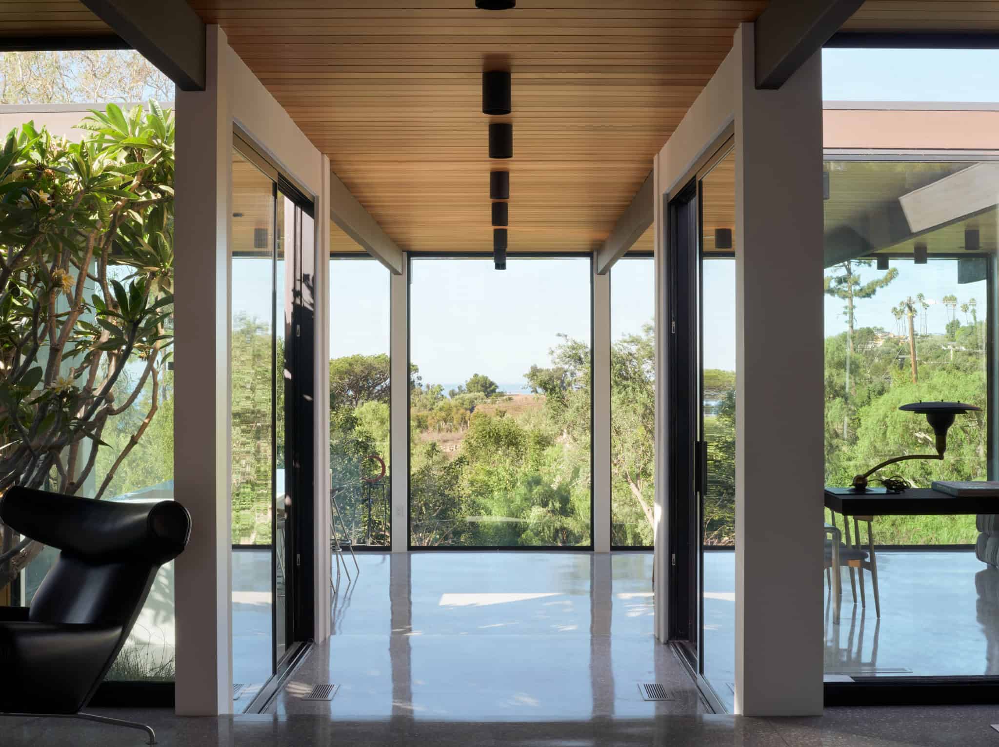 Malibu Glass Box House by Klopf Architecture – breezeway axis landscape view, Malibu, California