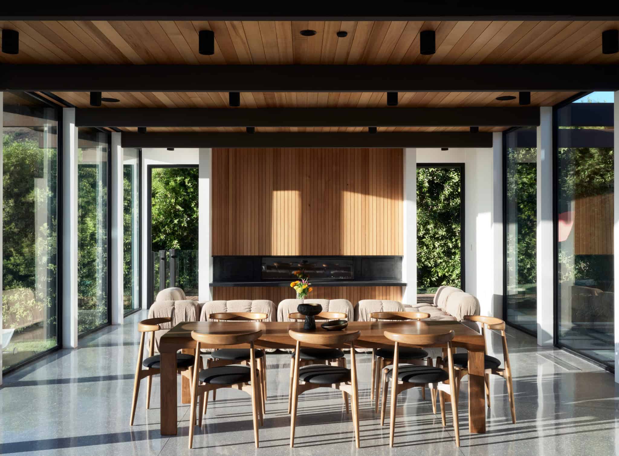Malibu Glass Box House by Klopf Architecture – dining room fireplace elevation, Malibu, California