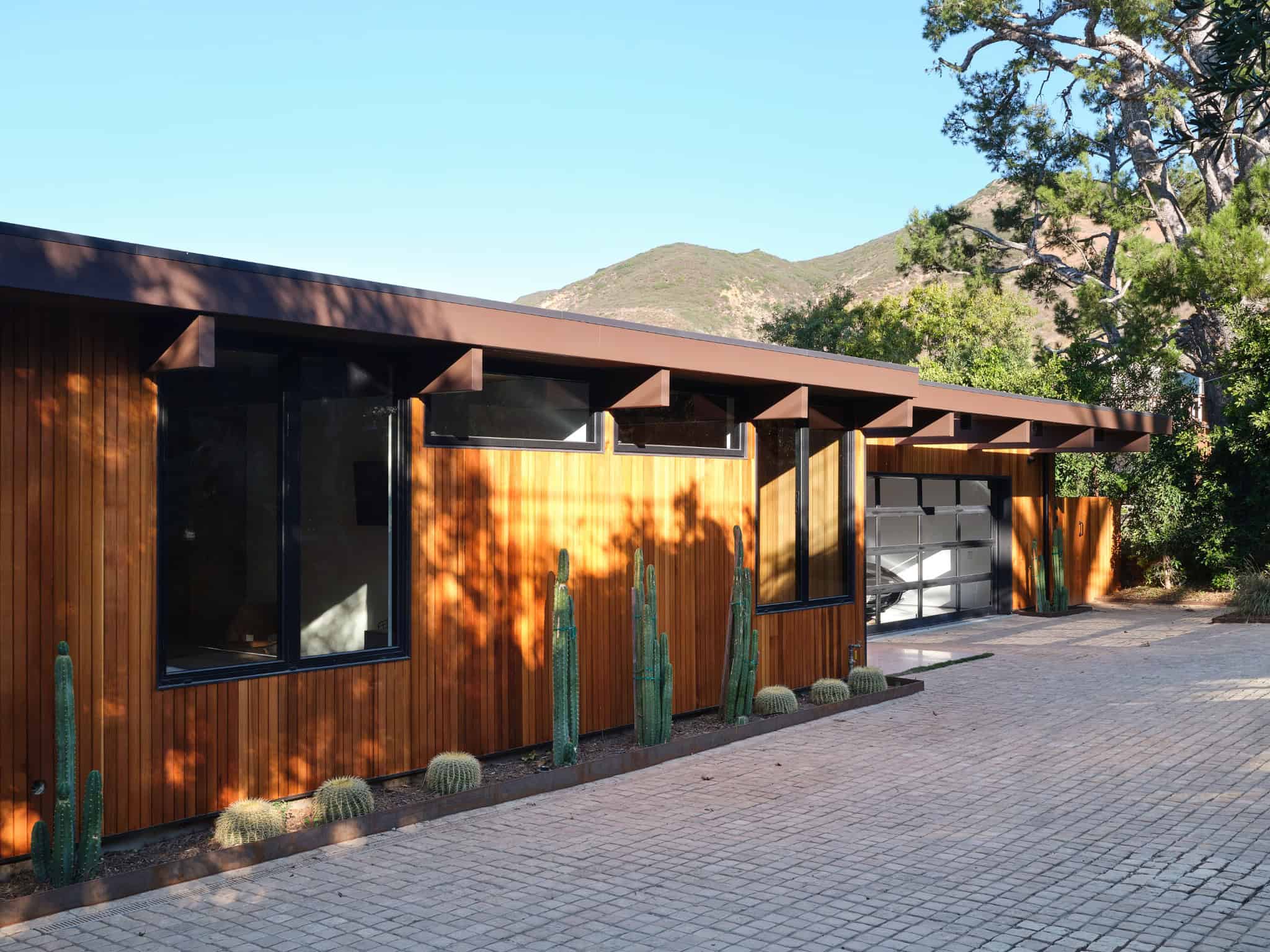 Malibu Glass Box House by Klopf Architecture – front facade and garage, Malibu, California
