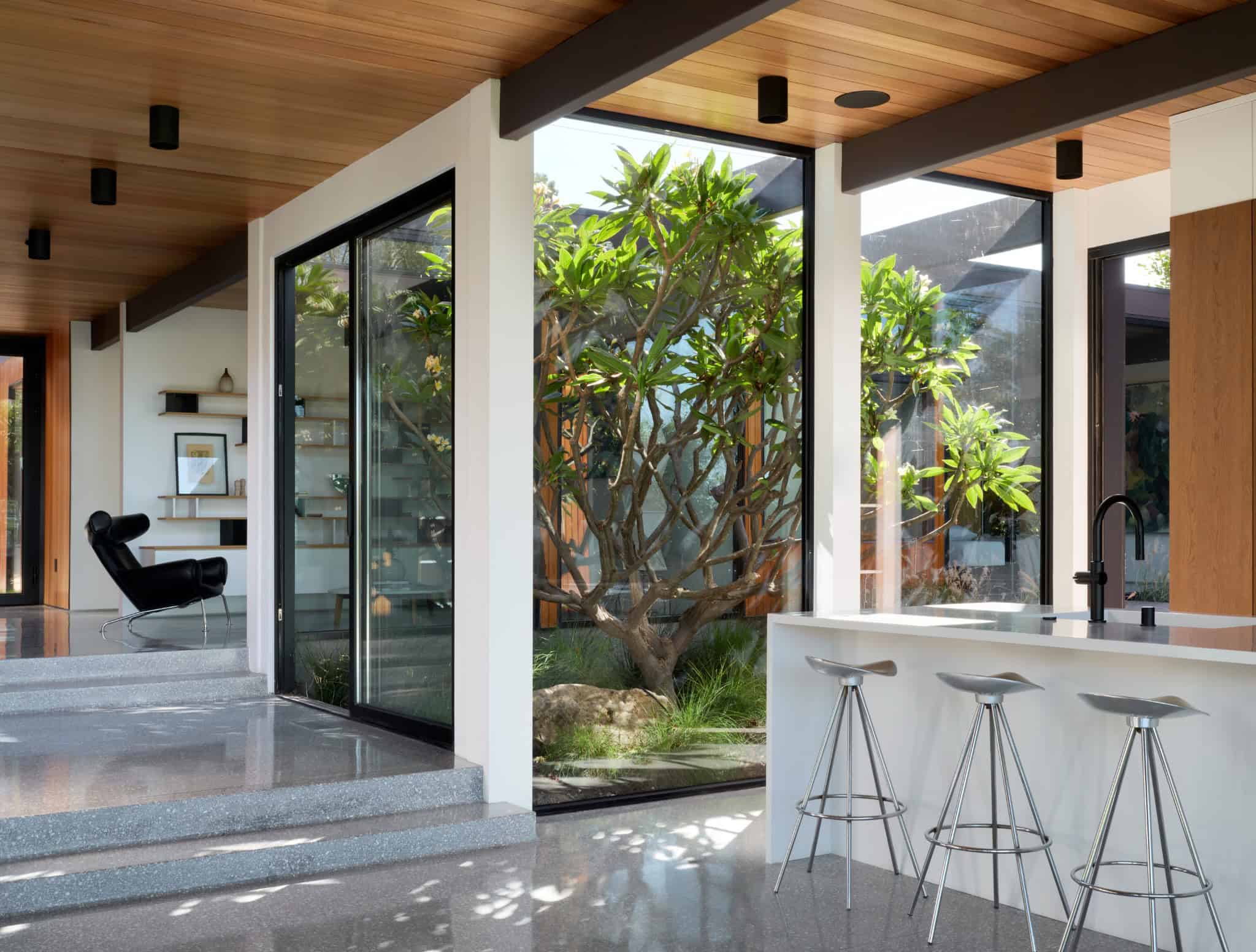Malibu Glass Box House by Klopf Architecture – kitchen courtyard connection, Malibu, California
